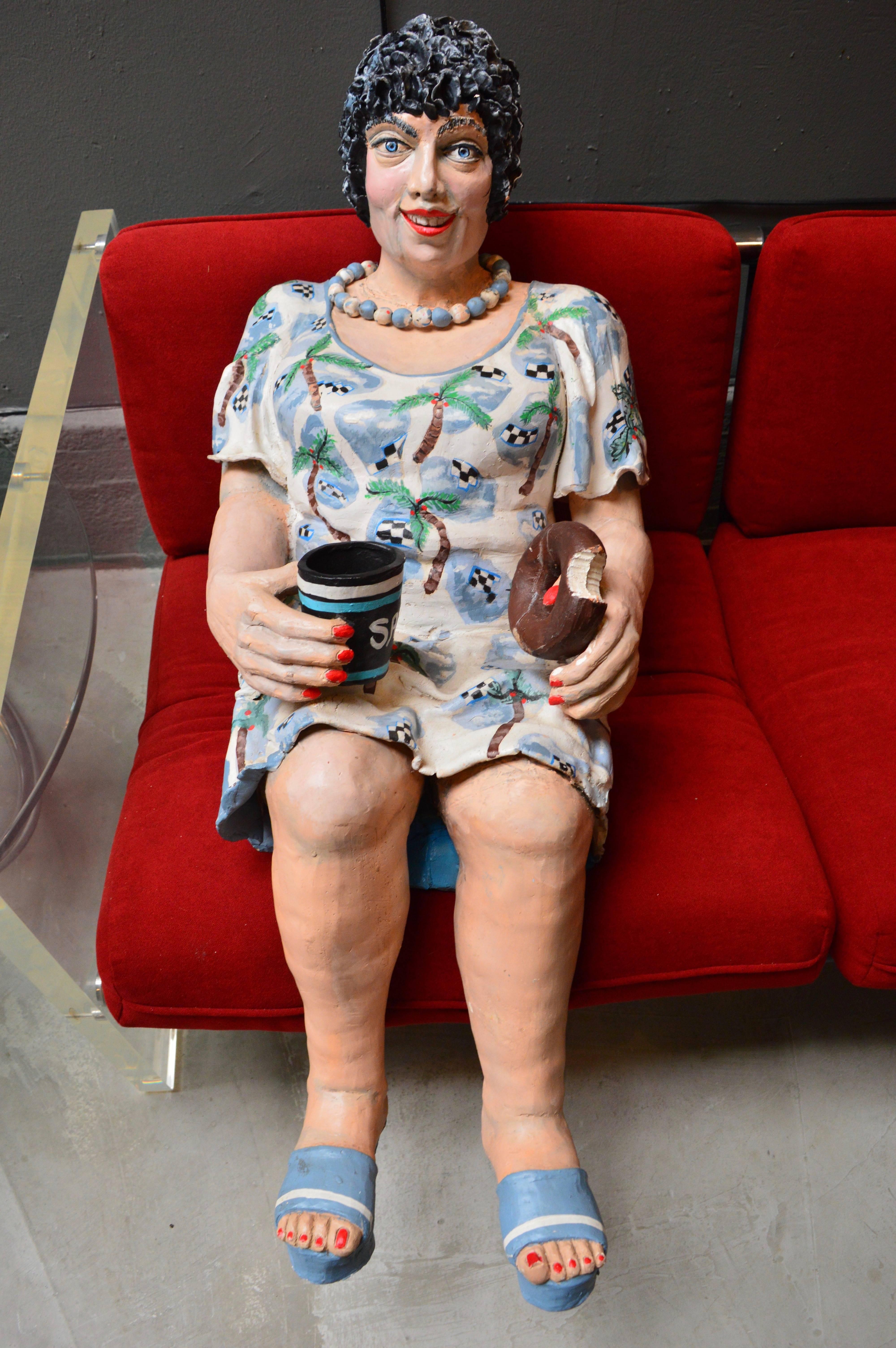 Beautiful life sized plaster sculpture by Estelle Tieman. An elderly woman named Sadie with a donut and coffee in hand. She's wearing a Hawaiian Mumu dress and a necklace.  Its a fantastic sculpture with a ton of presence. Very heavy. Signed 95'.