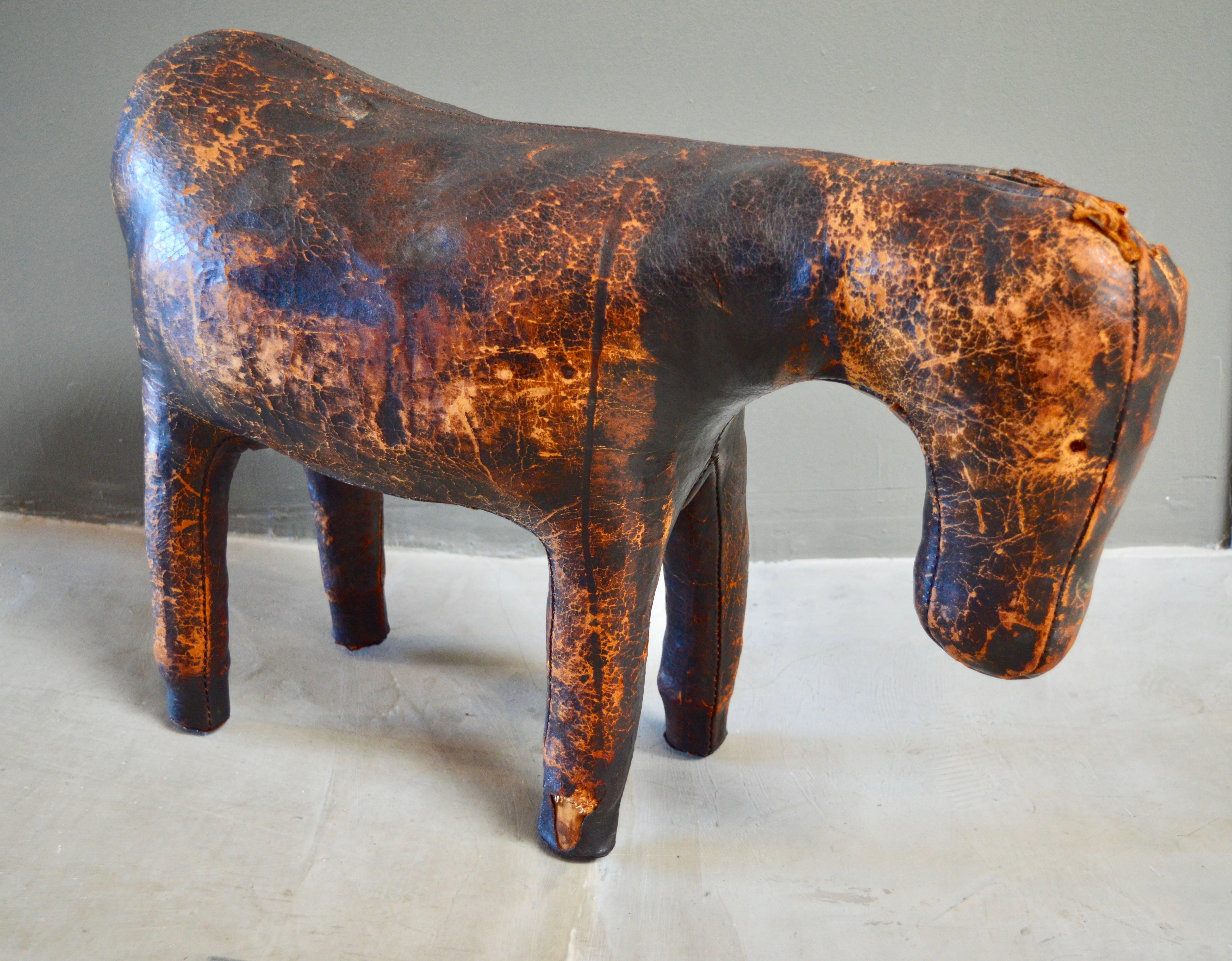 Classic leather donkey by Omersa. Definitely a very early model. Missing eyes and ears and tail. Great looking age and patina. Perfect stool, ottoman or sculptural accessory.