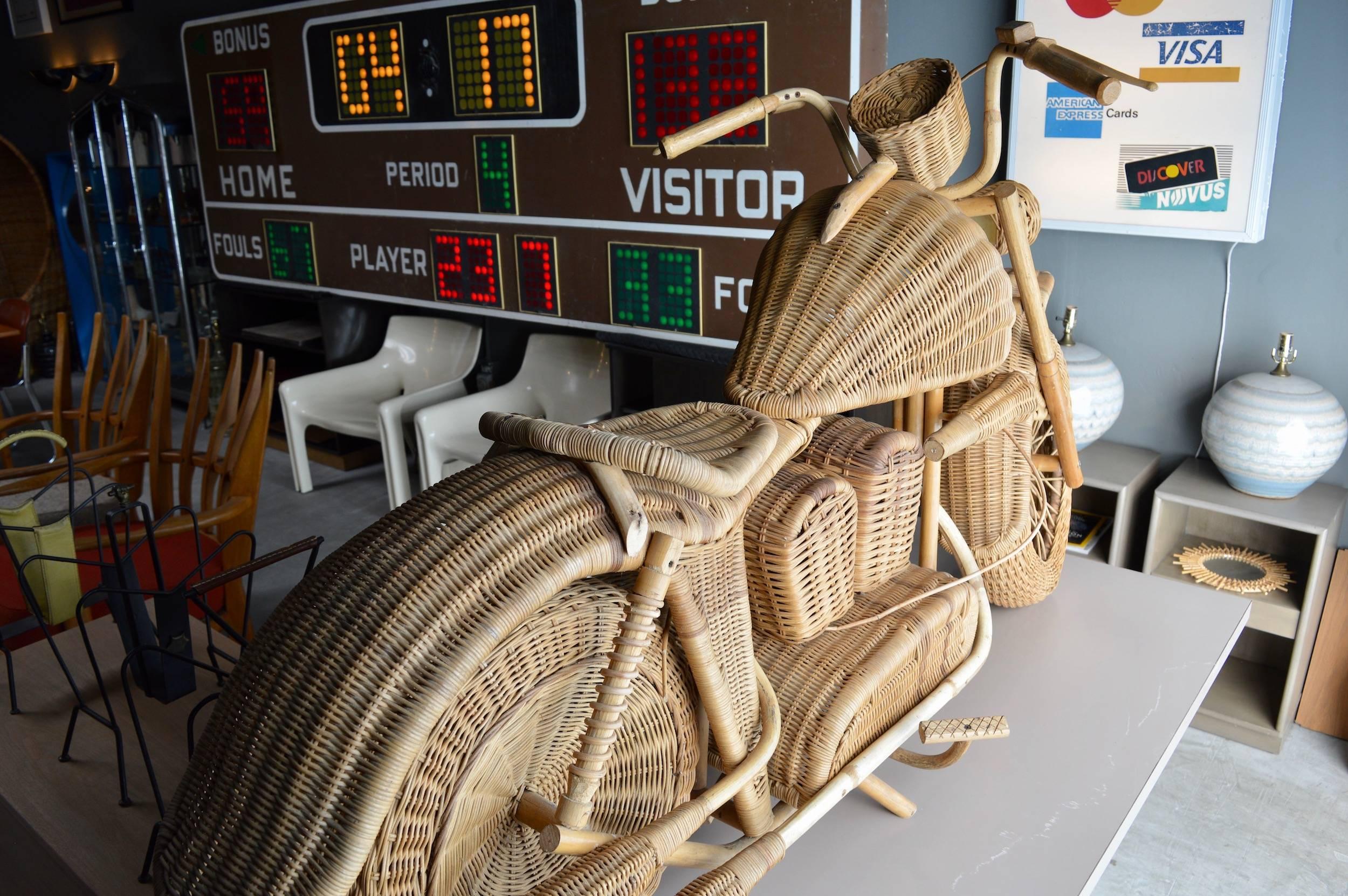 True to size Harley Davidson motorcycle made out wicker, rattan and bamboo. Fantastic detailing throughout. Gorgeous sculpture.