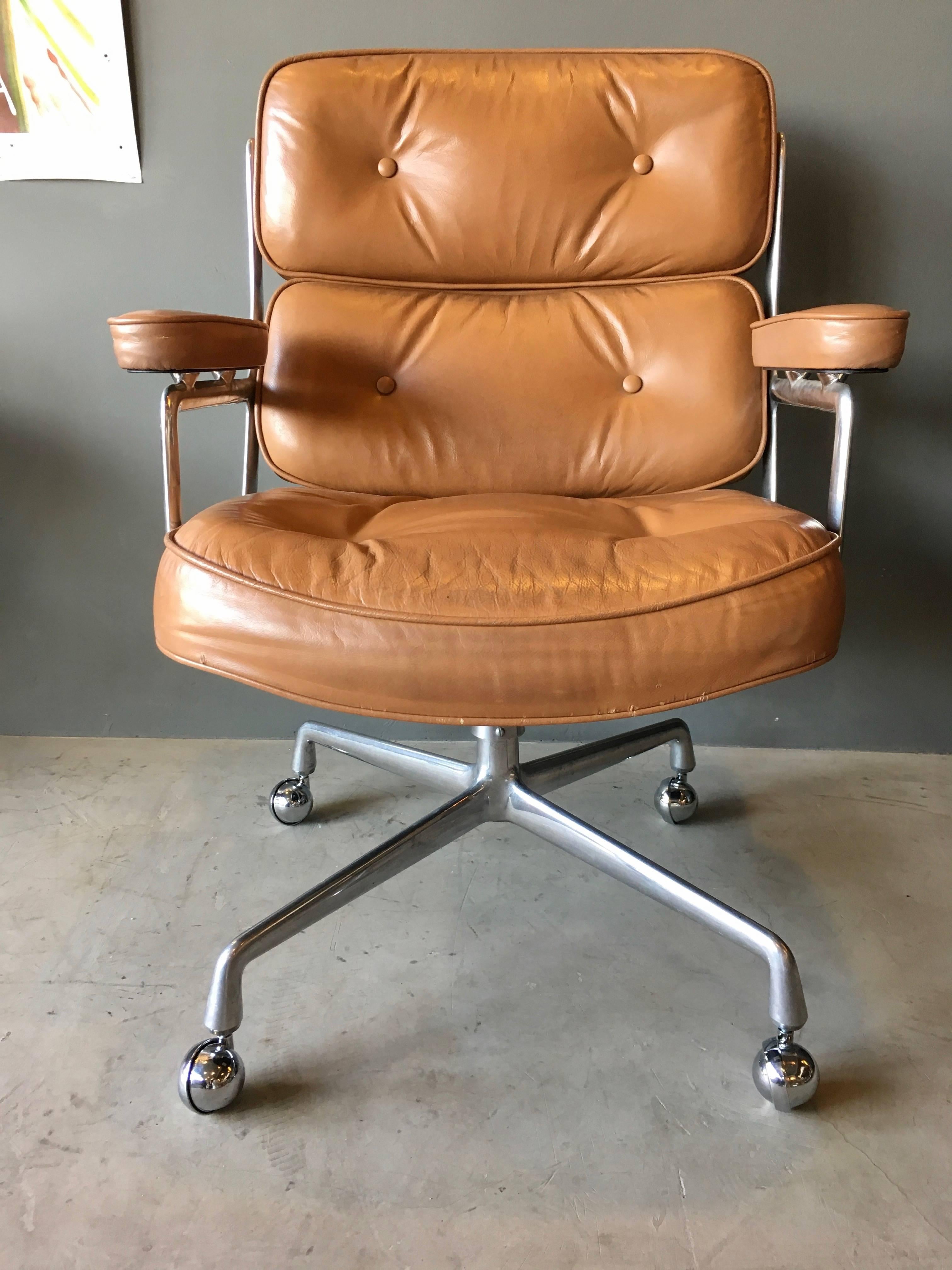 Great vintage leather office chair from the Time Life building in New York. Original tan leather very good vintage condition. Gorgeous age to leather. Chair swivels, reclines and is height adjustable. New casters. Original aluminium frame also in
