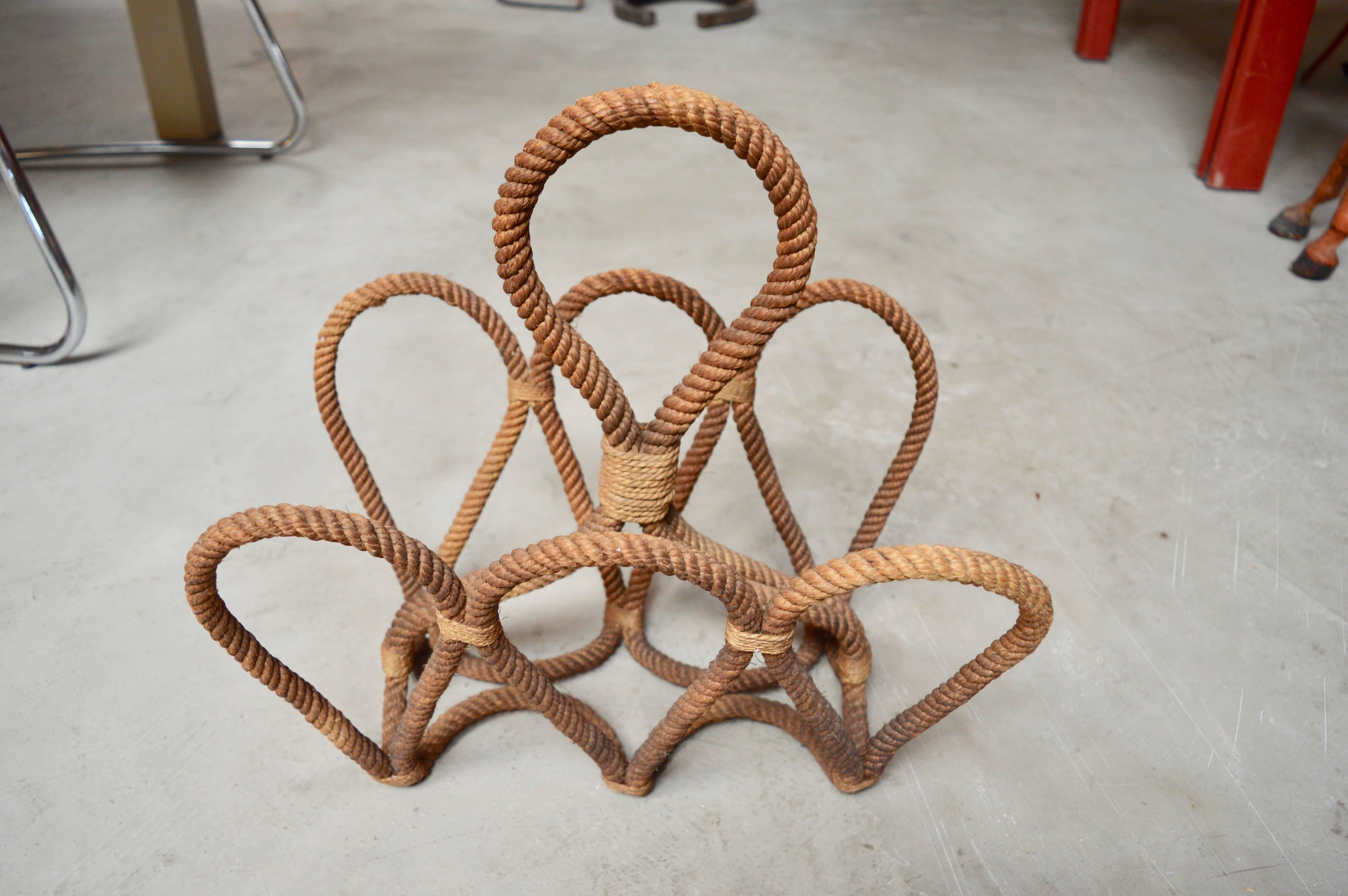 Handsome French rope magazine rack by Audoux and Minet. Twisted rope. Fantastic design. Great vintage condition.