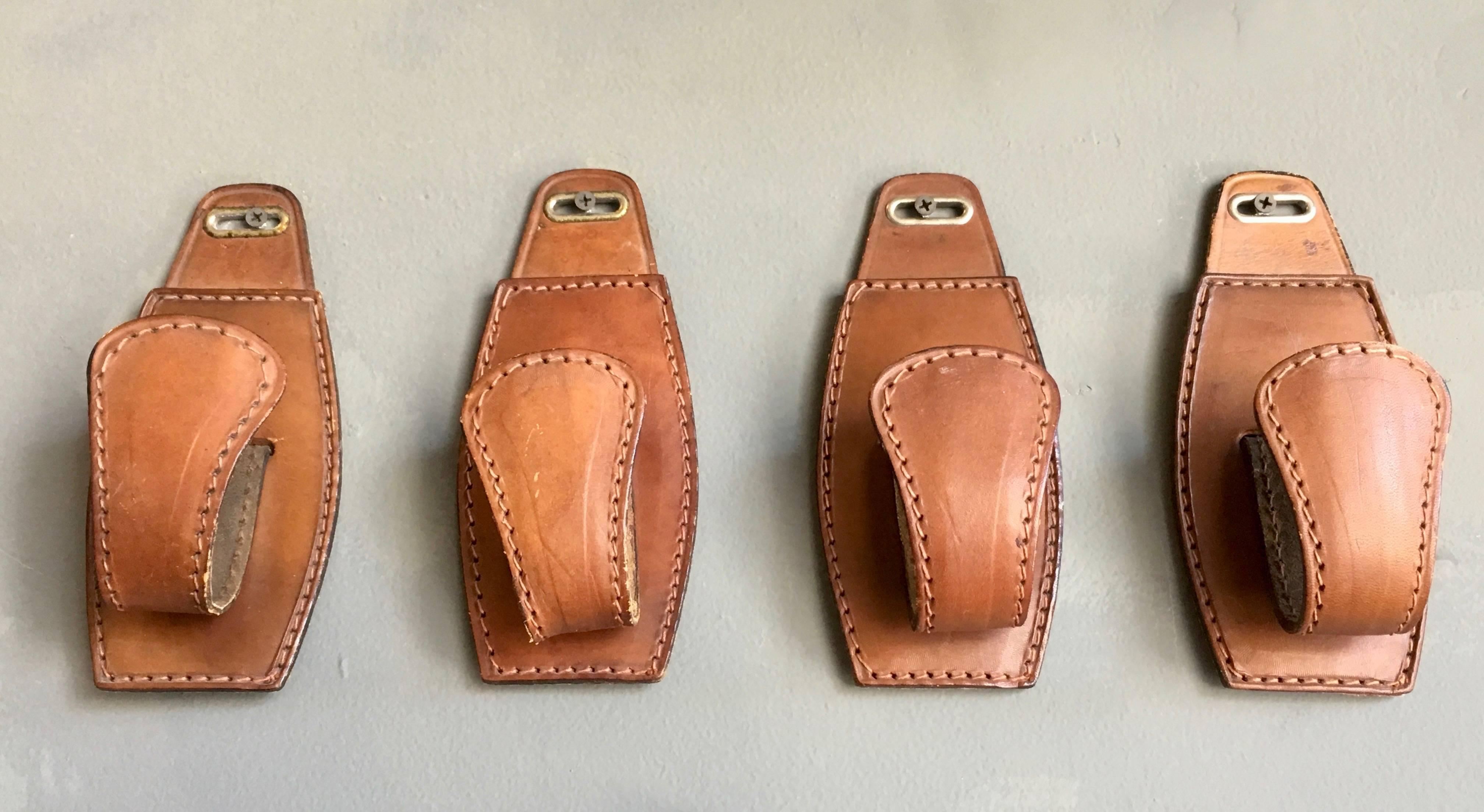 French Set of Four Adnet Style Saddle Leather Hooks