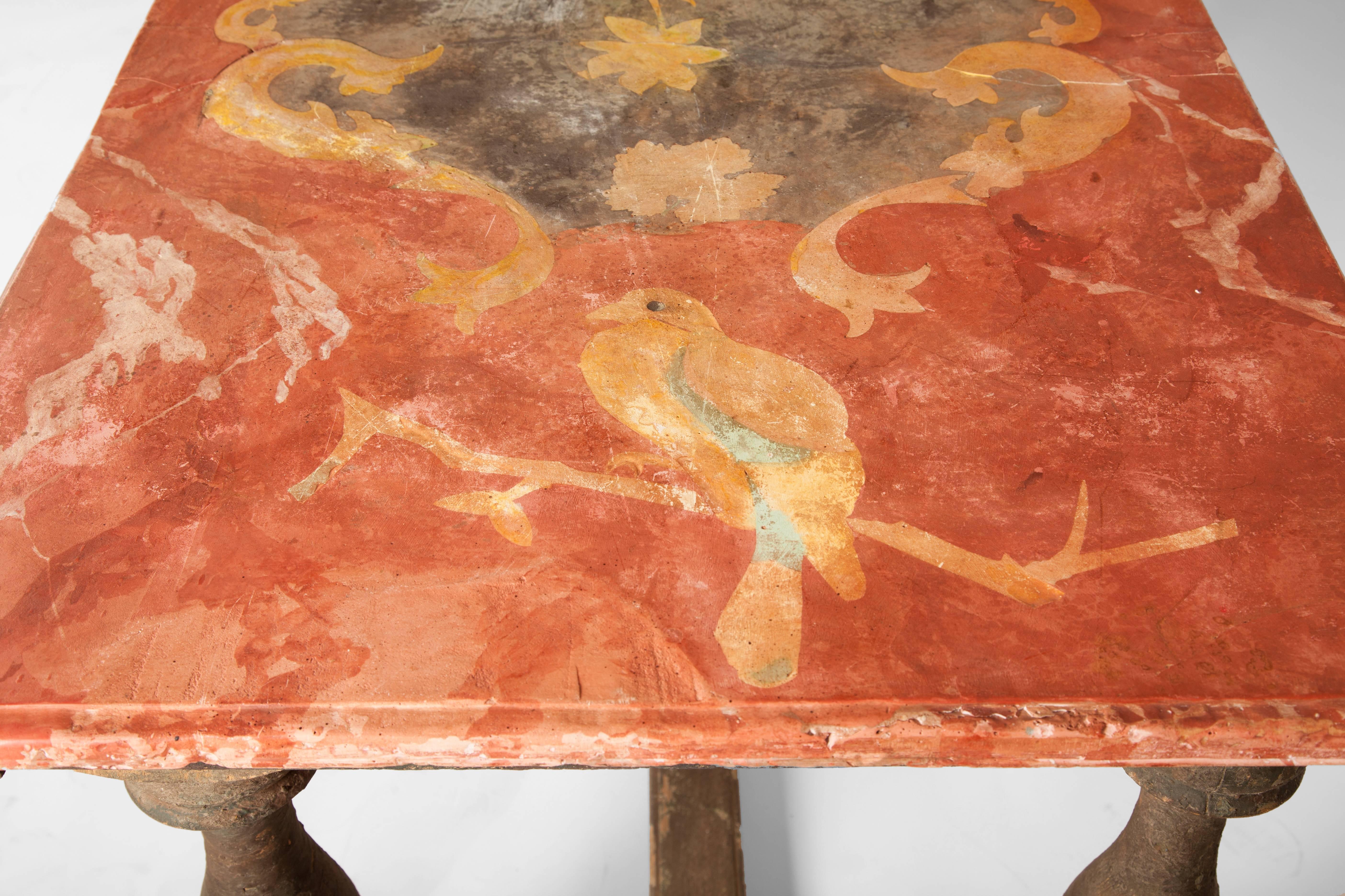 A very rare pair of 18th century Italian chalk limestone and wood tables. The wood bases are painted. The top is a beautiful coral, green and yellow chalk limestone composition. They are delicate, and show some wear, but are in excellent condition