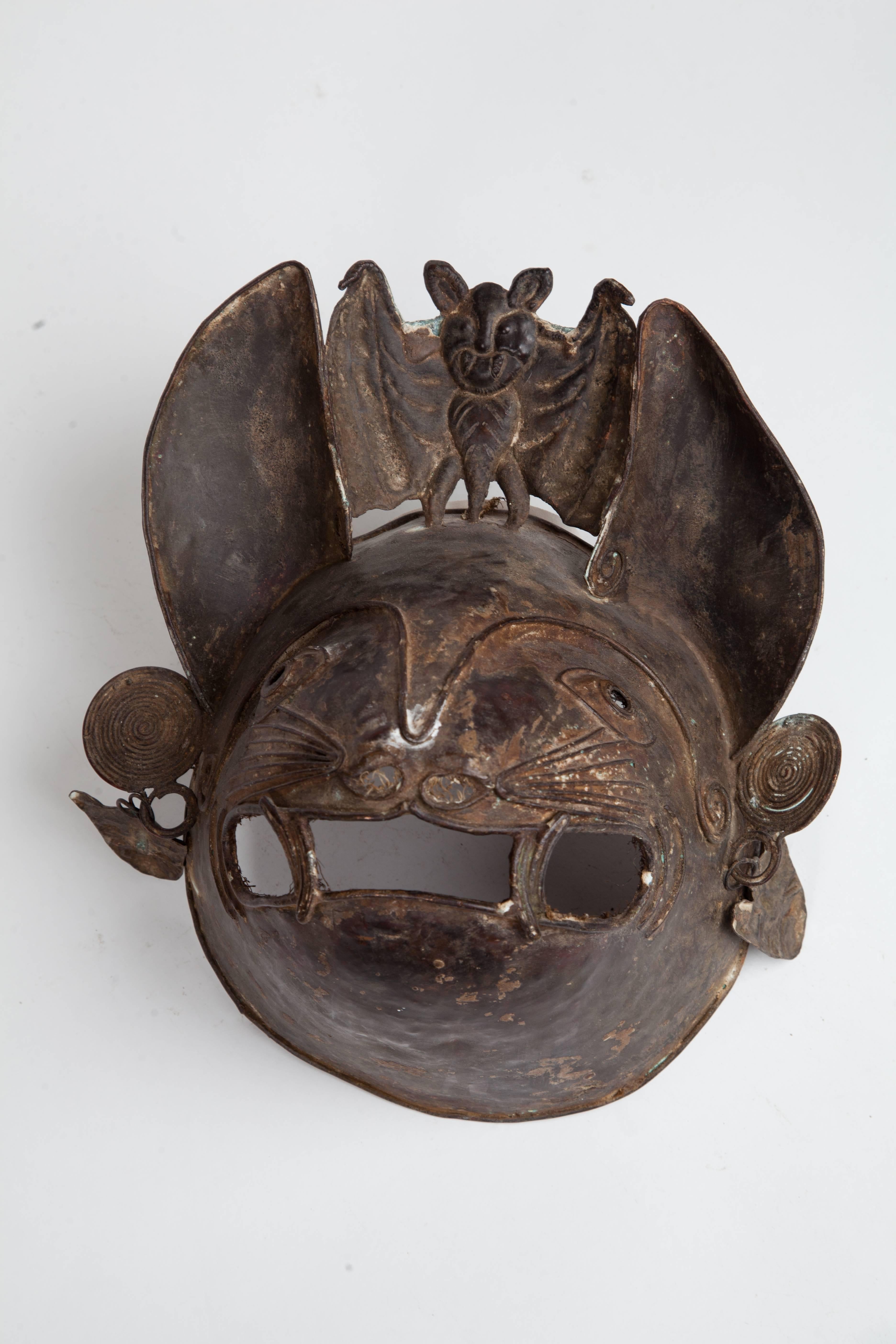 Unusual antique Mexican copper ceremonial dancing mask in the form of a bat.