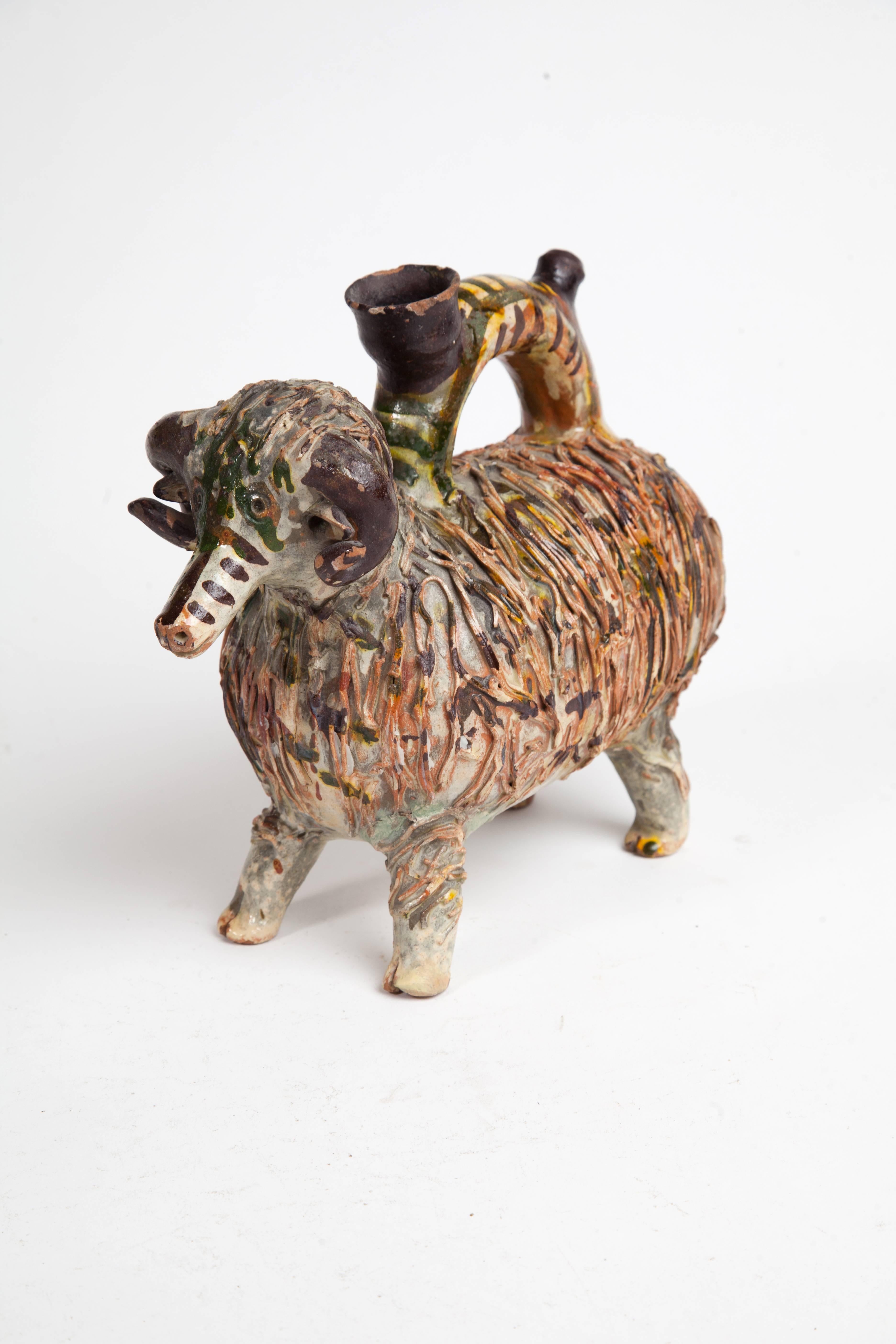 Very charming hand-painted pottery creamer in the shape of a ram.  19th Century, Transylvania.