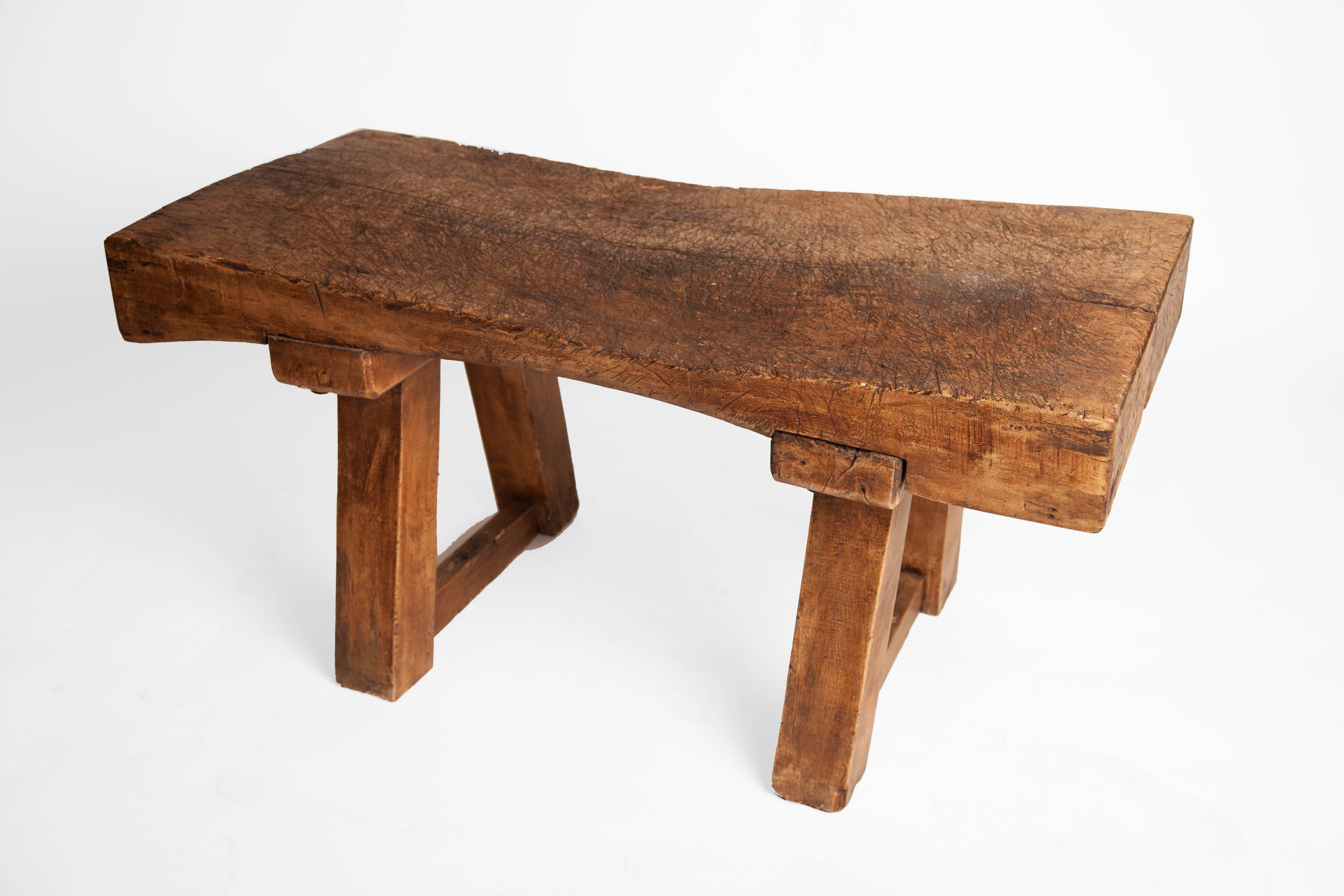 Great as a coffee table, this is a rustic antique chopping block, English, circa 1900.

 