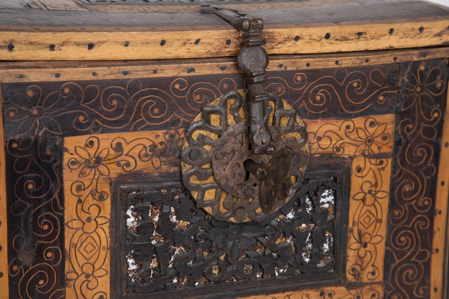 Magnificent 18th century Bolivian locking escritorio with inlaid wood and hand-forged iron details.