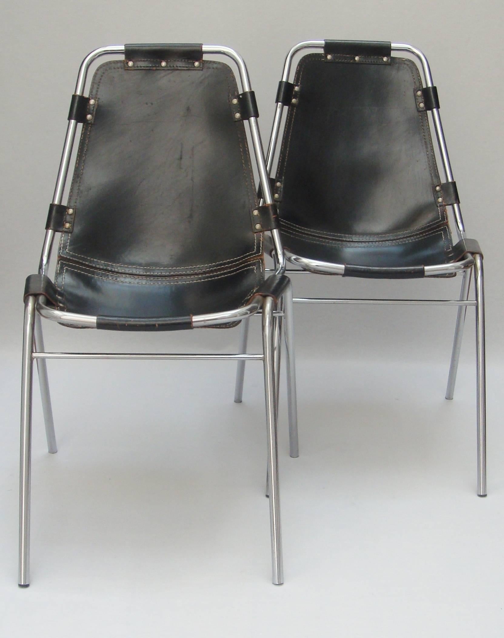 A pair of black leather and chromed steel stacking chairs
selected for Les Arcs Ski Resort,
French, circa 1960.