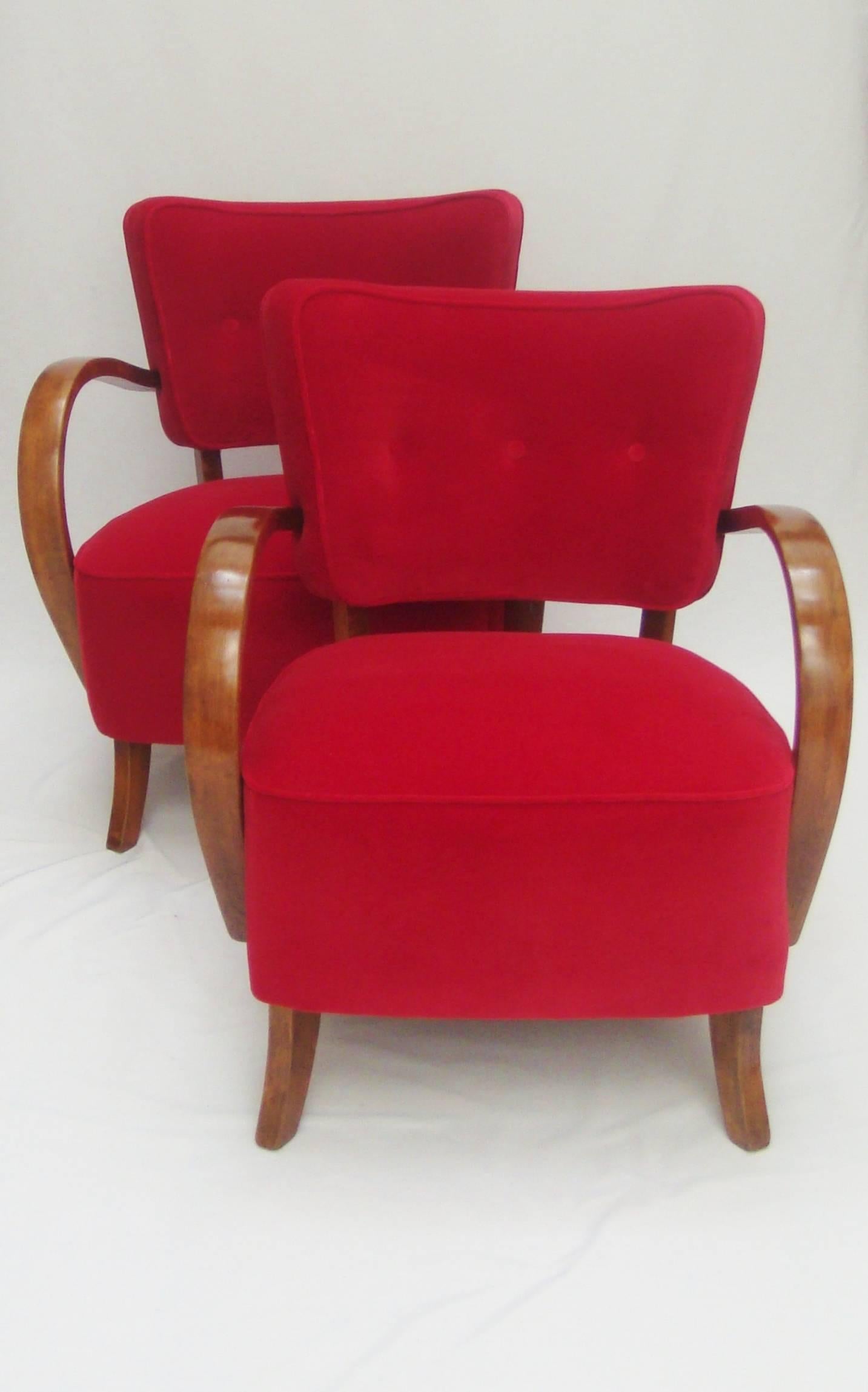 A pair of H-237 armchairs designed by
Jindrich Halabala, manufactured by UP, Brno.
Upholstered in designers guild Varese velvet.
 