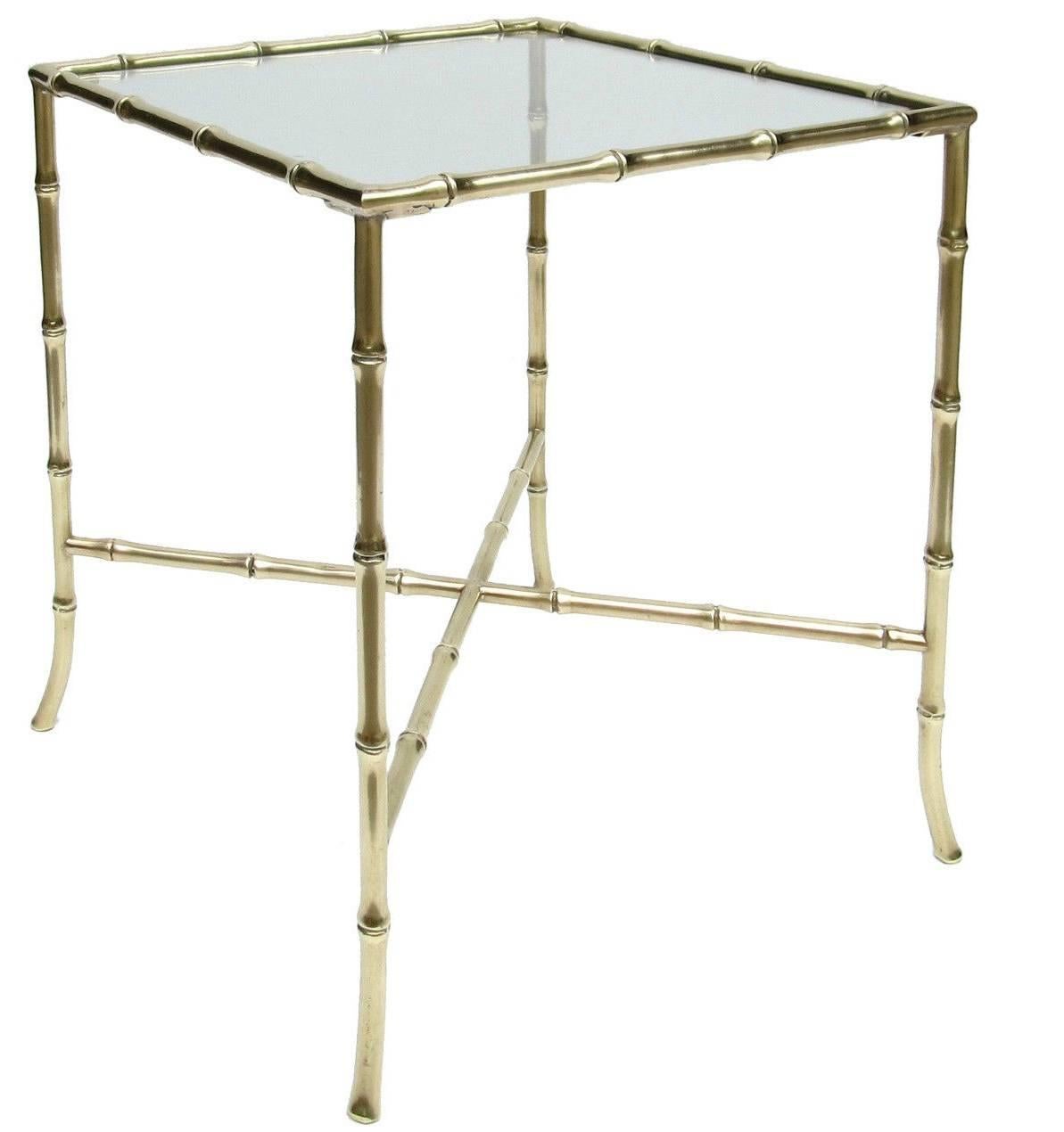 Pair of brass bamboo Chinoiserie side tables. Clear glass tops.