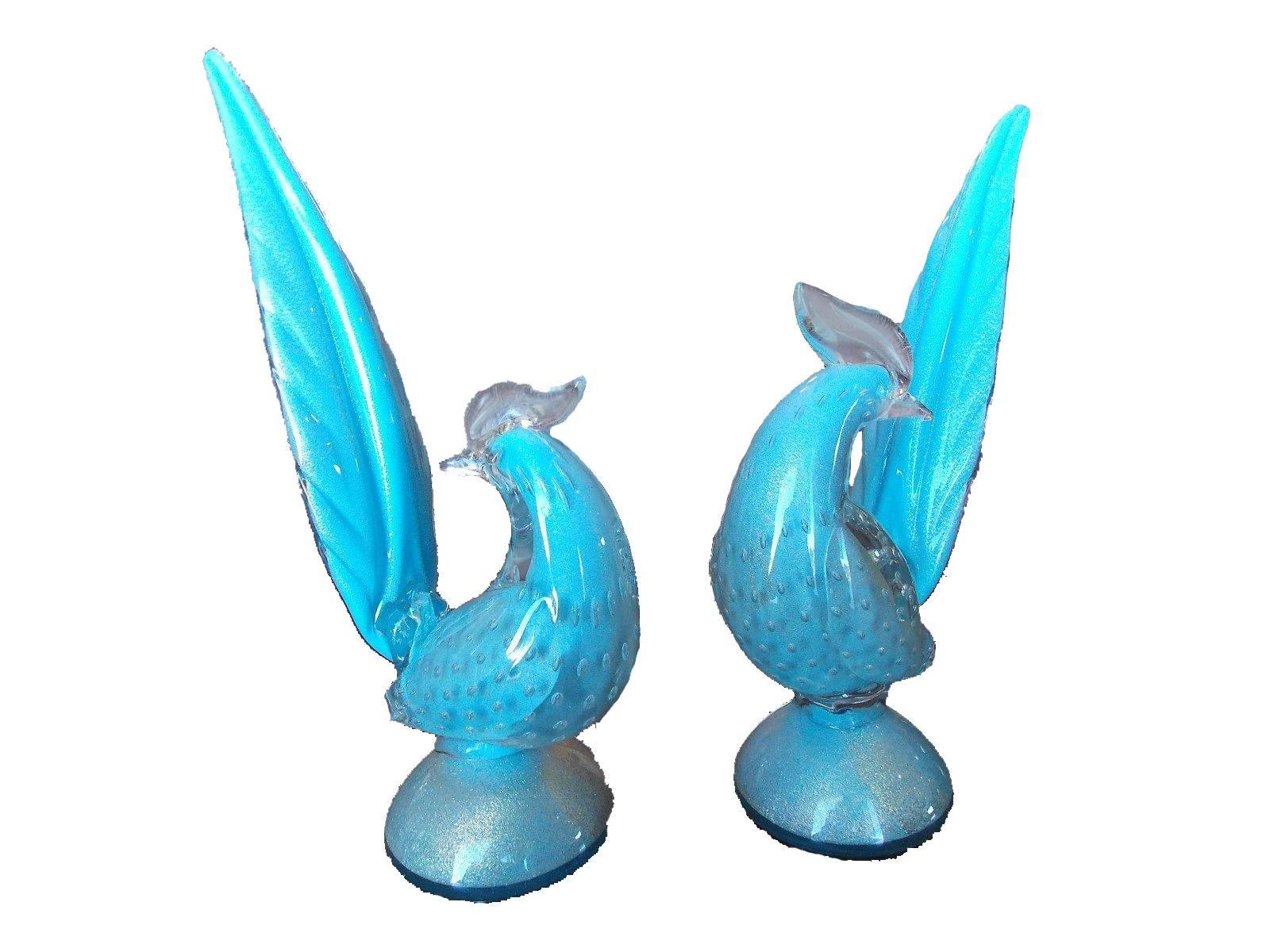 Mid-Century pair of Murano glass birds by Barbini. Robins egg blue with all-over bullicante (controlled bubbles) and gold flecks. One bird is slightly taller than the other.