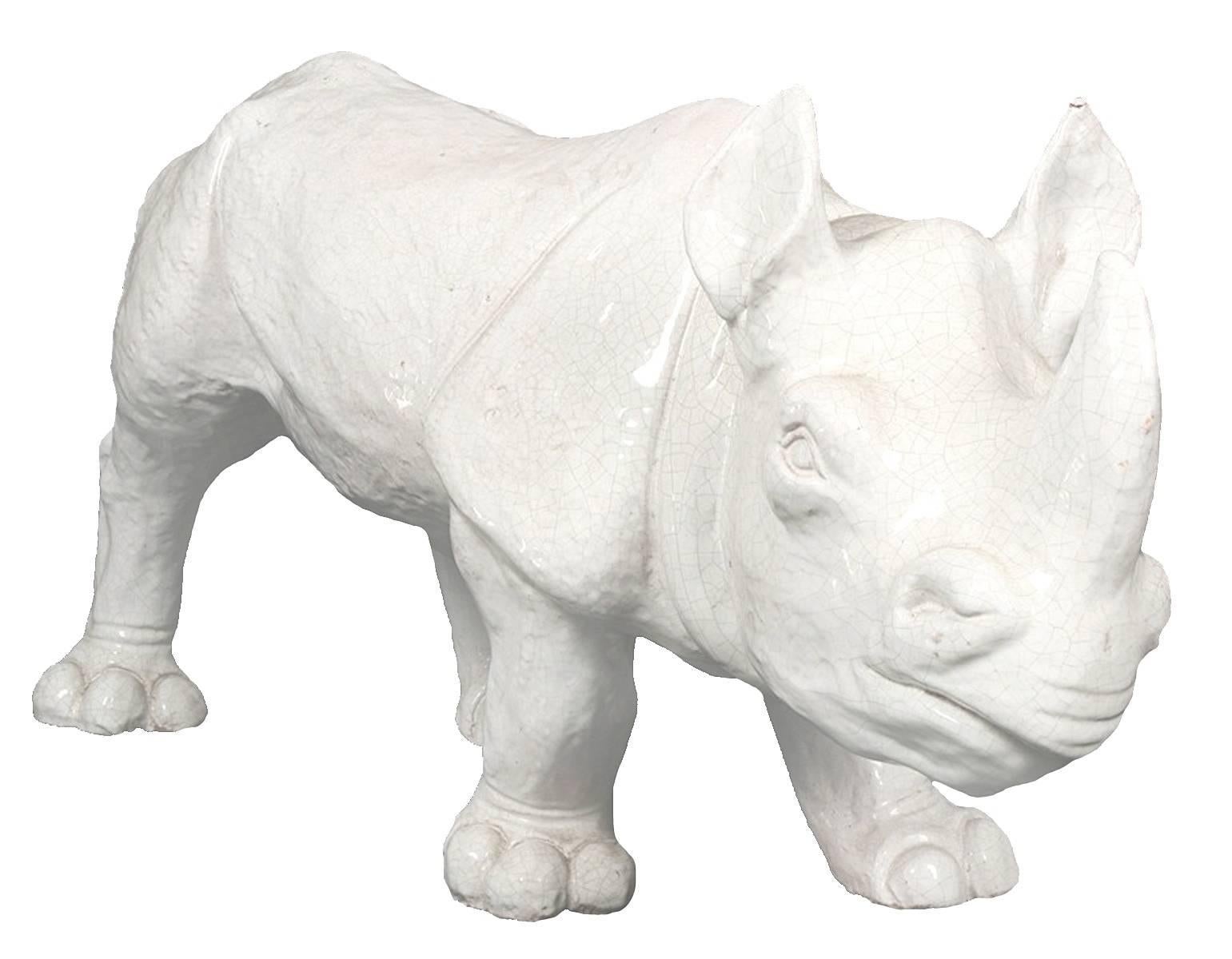 Large statement making 1970s rhino. Overall white crackle glaze finish. 
Light wear around the edges and feet. Attributed to Trouvailles Furniture Inc.