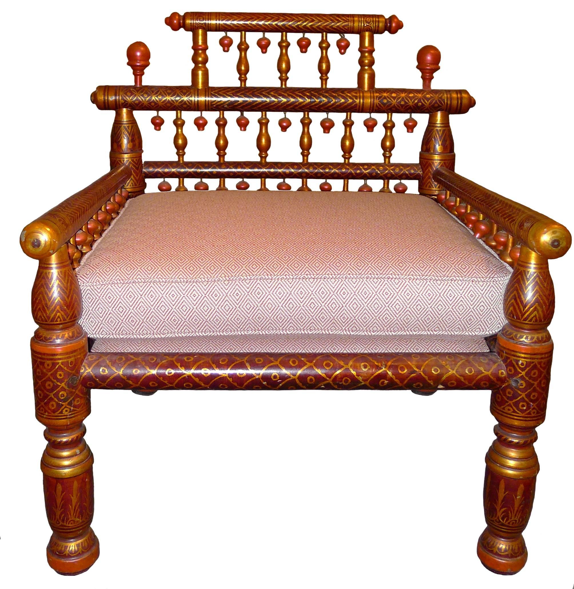 Indian Sankheda painted armchair. Lacquered and hand-painted teak wood. Newly upholstered in Rogers & Goffigan red indoor or outdoor fabric. Seat, 18" H.