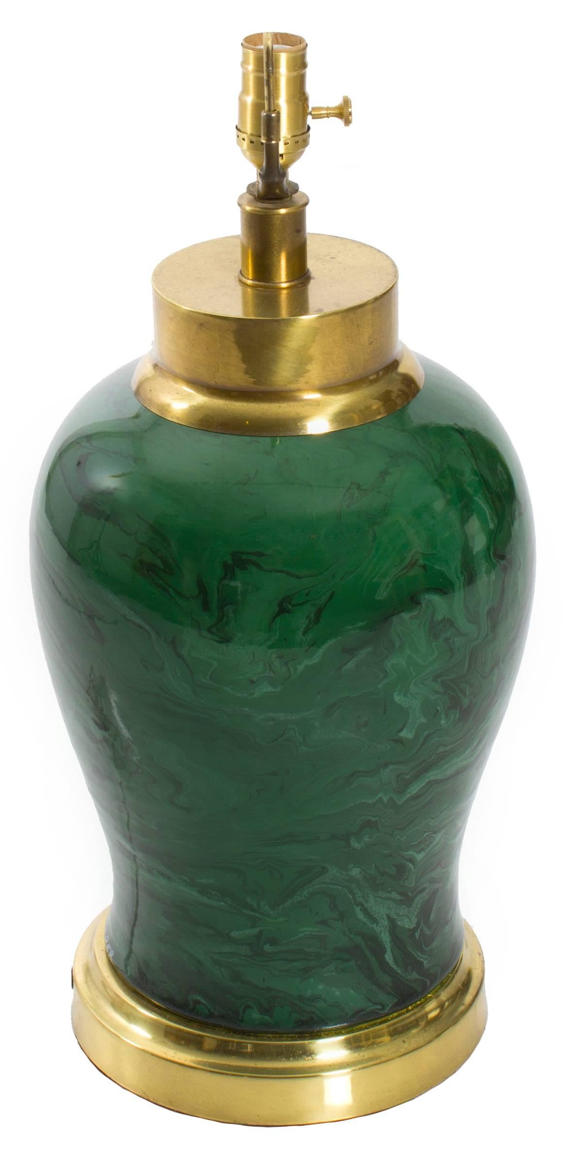 Green ceramic malachite lamp by Frederick Cooper. Brass fittings with overall unpolished patina. Newly rewired. Takes one standard bulb. Lampshade and harp are not included.