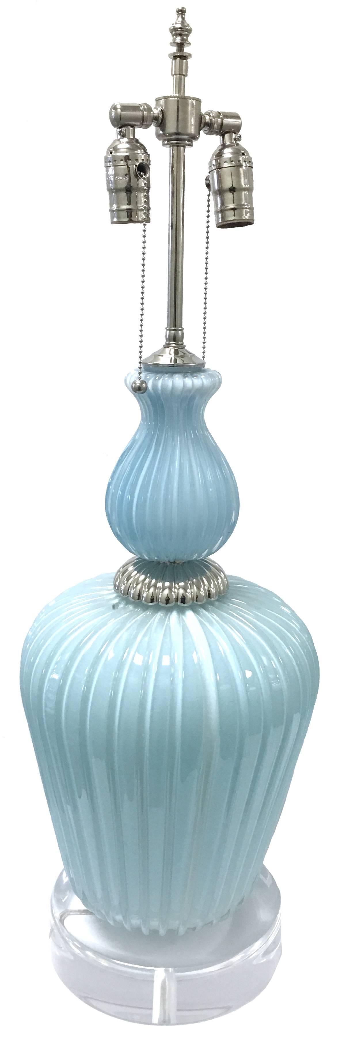 Single large Mid-Century Murano glass lamp by Barovier & Toso. Ribbed light blue glass. Top portion of glass is slightly darker than the bottom. Polished chrome centre medallion. Newly rewired. Takes two standard bulbs. New Lucite bases with