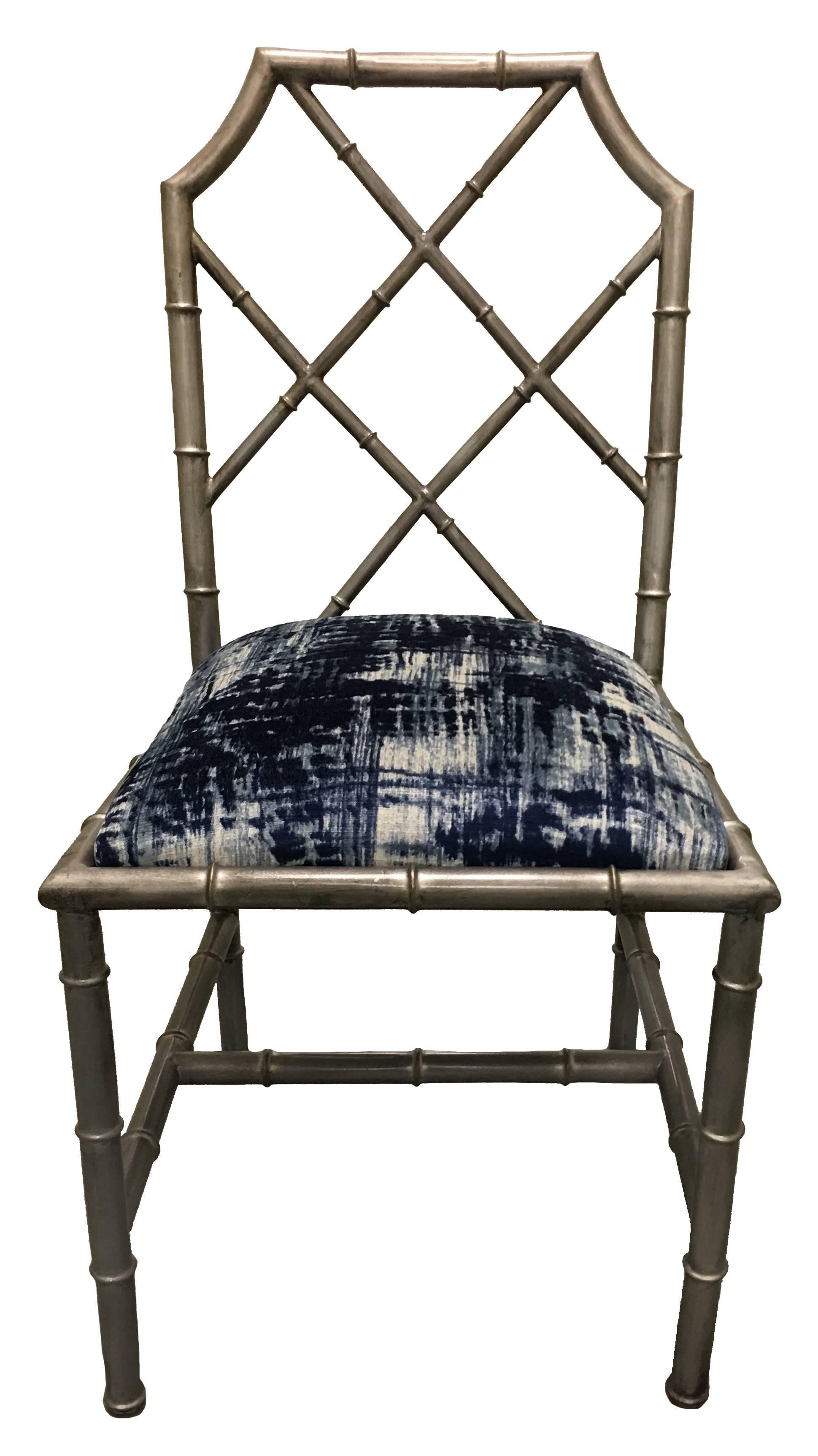 Pair of Italian metal bamboo side chairs. Recently repainted in a burnished faux silver leaf finish. Newly upholstered in Ralph Lauren abstract printed blue or white velvet. Stamped on the underside 'Made in Italy'. Measures: Seat is 17.5