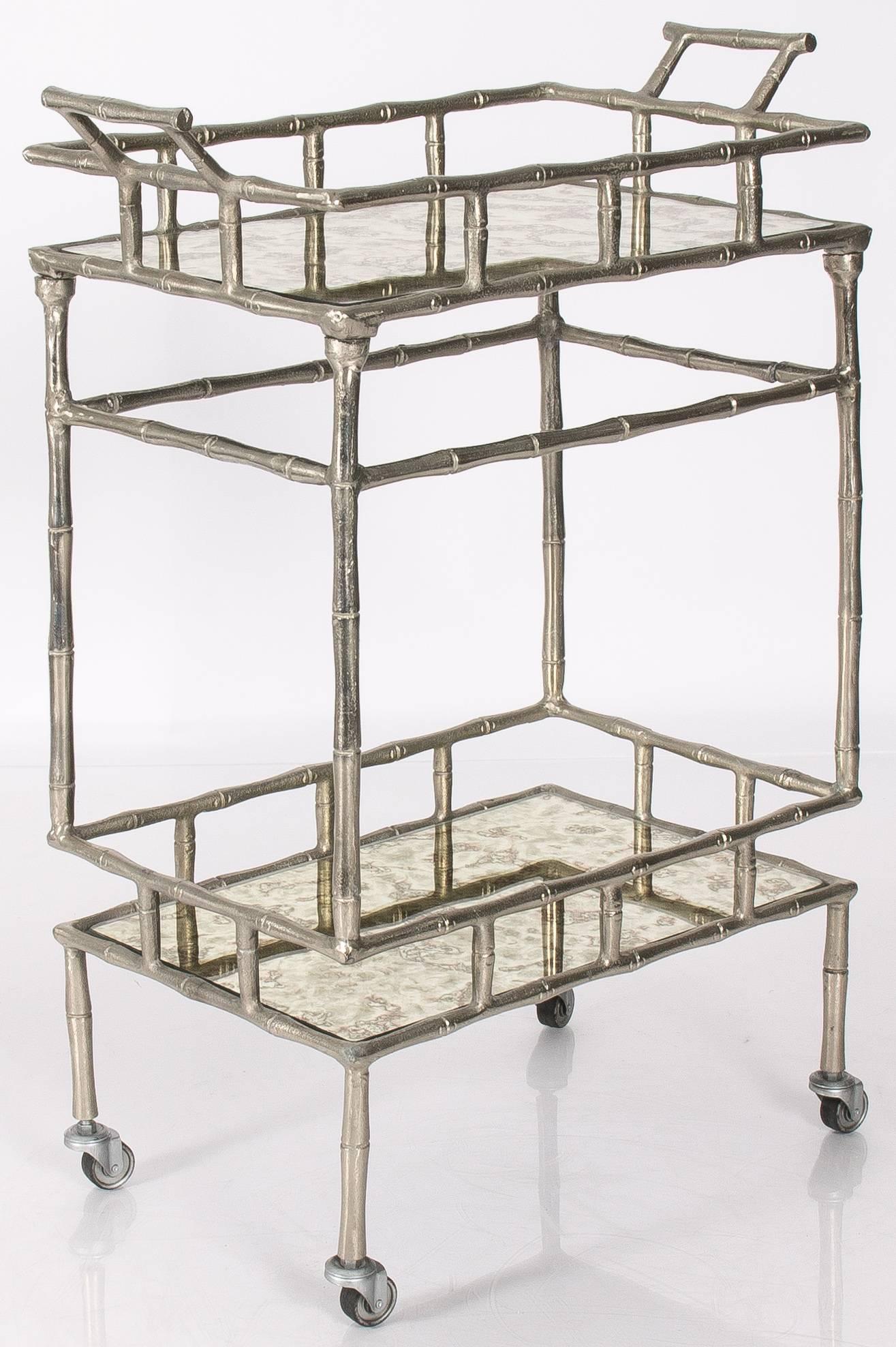 Mid-Century polished chrome faux bamboo two-tier bar cart. New antique style mirrored glass shelves. Measure: First shelf is 12