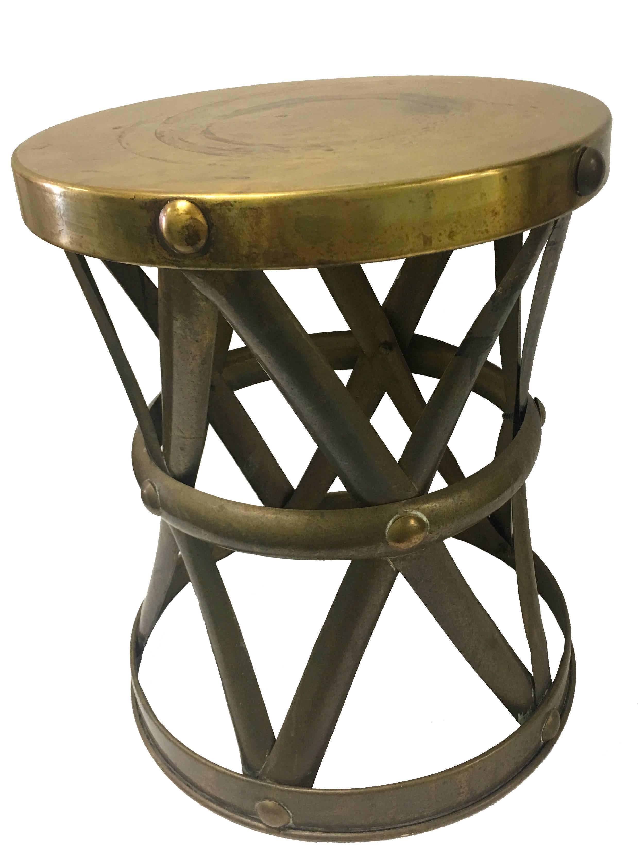 Brass X-base drum stool. Stamped 'Made in Hong Kong'. Overall unpolished as found patina.