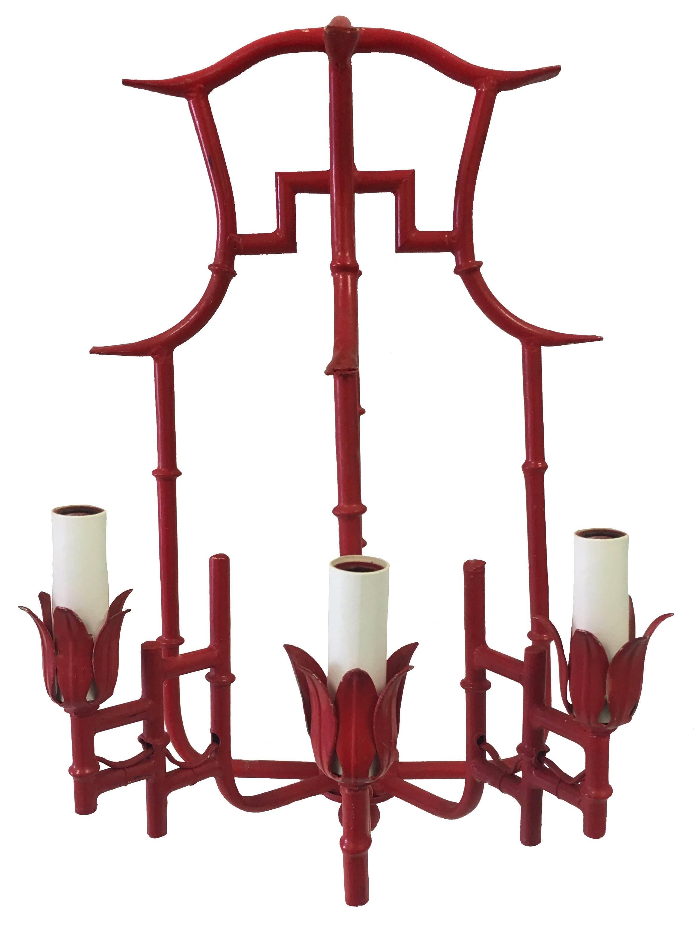 Pair of red chinoiserie bamboo style scones. Tagged 'Made in Italy'. Newly rewired. Each sconce takes three chandelier bulbs. Backplates will be required for installation (not included).