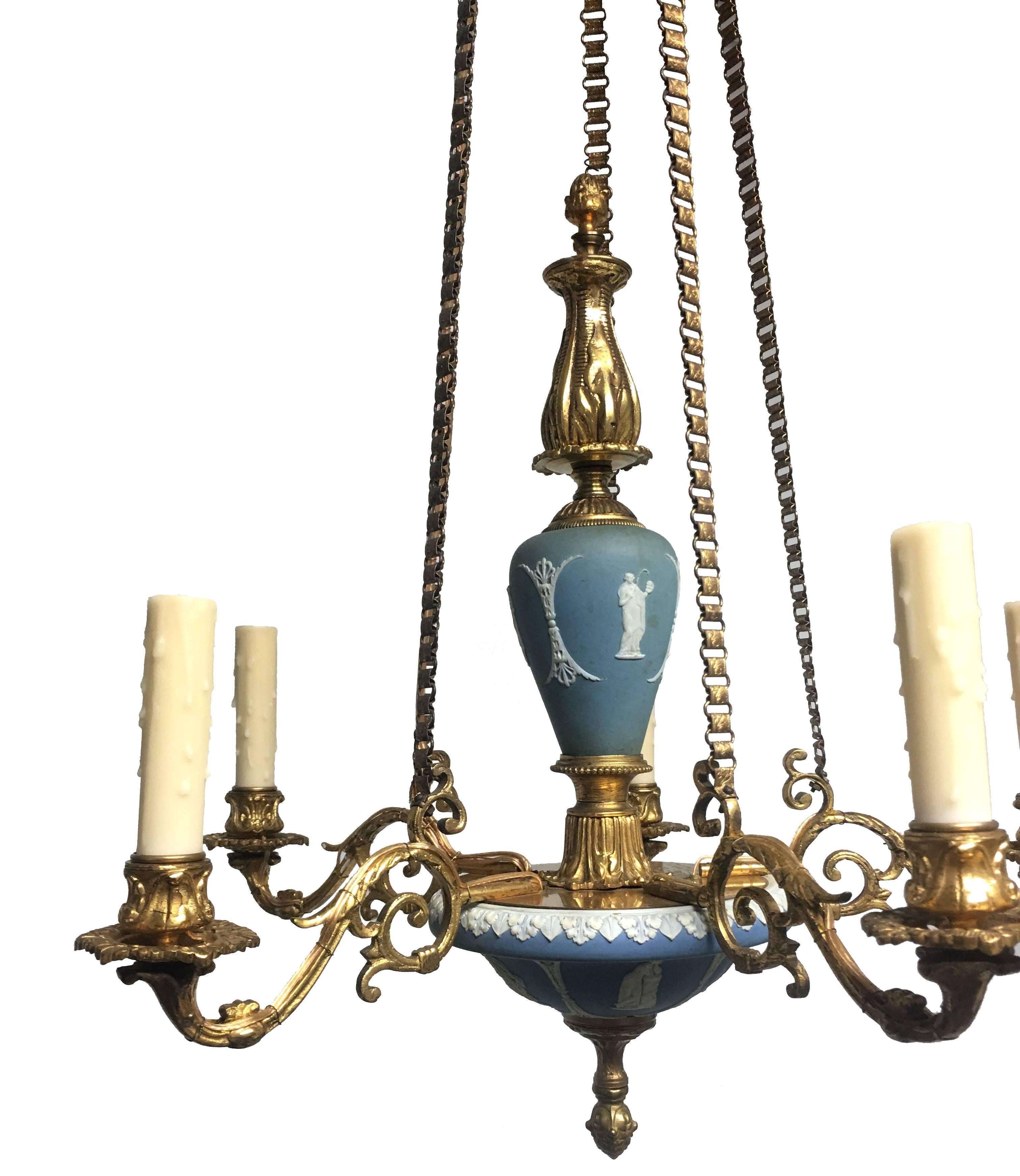 19th century English neoclassical style chandelier. Light blue and white Wedgwood with bronze arms and detailing. Newly rewired. New beeswax candle covers. Fixture takes five chandelier bulbs.