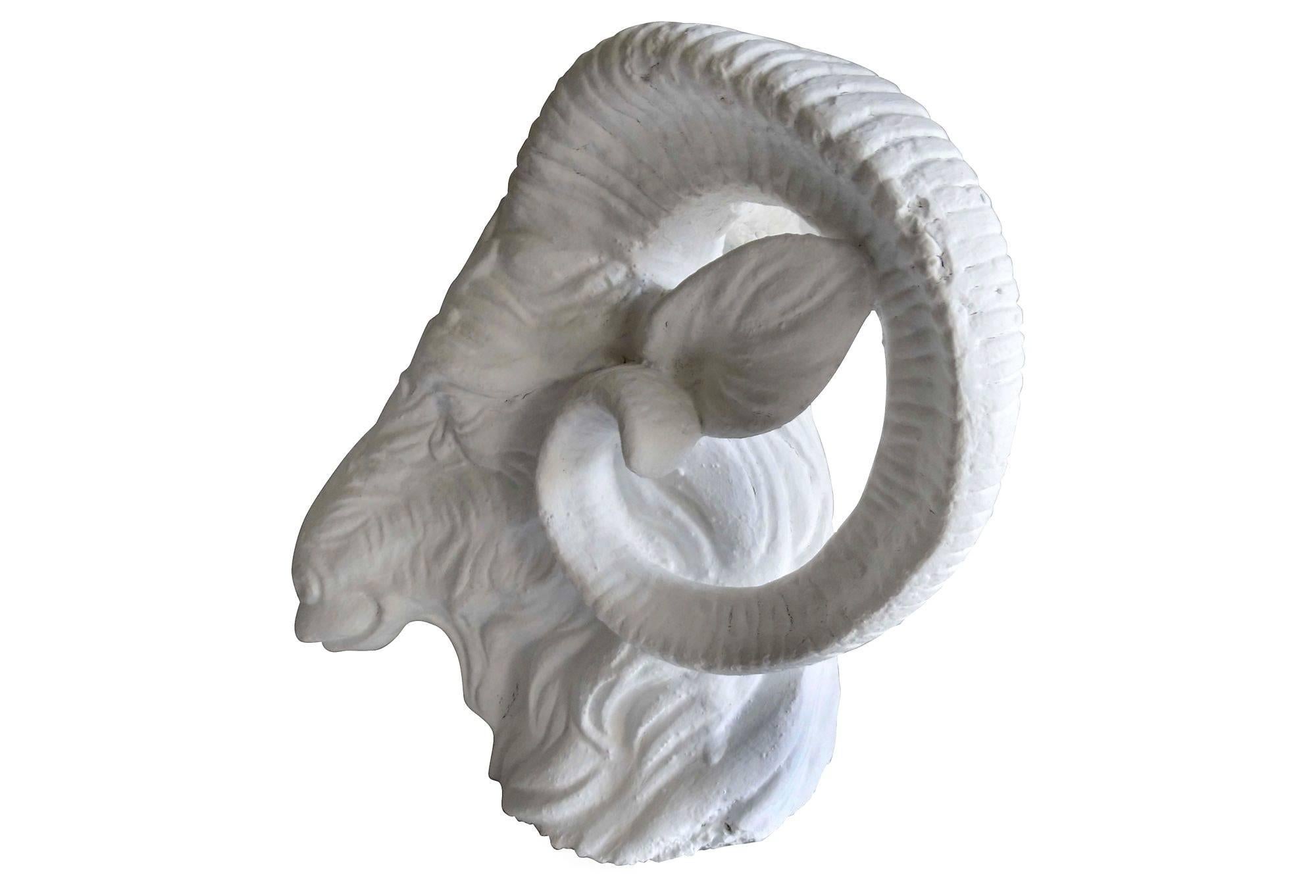 Mid-Century Italian plaster ram's head in a gessoed white finish with light areas of loss. No maker's mark.