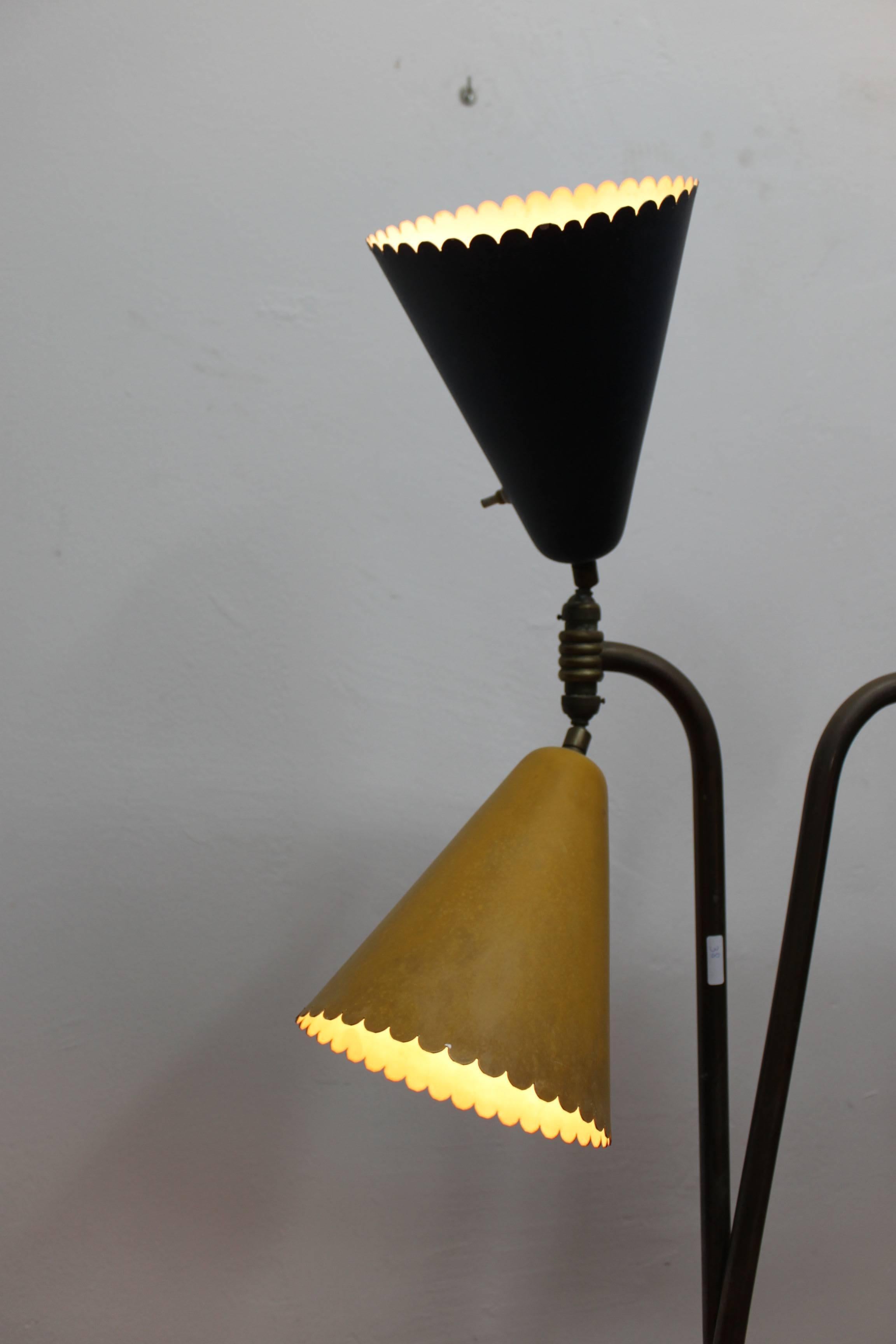 Floor lamp with four lights. 
Color cones: Red, blue, Yellow and green.
This lamp is attributed to Stilnovo.
Designer unknown.