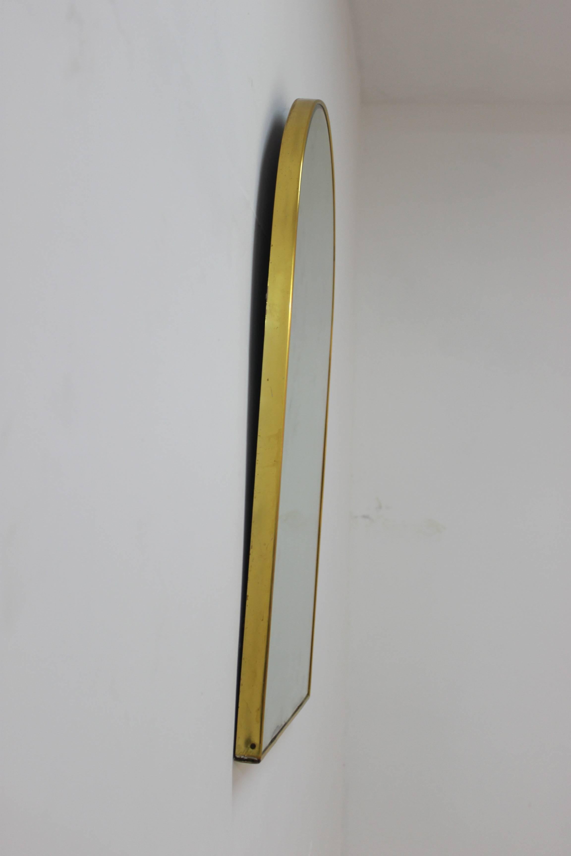 Italian mirror with brass details,
circa 1960.
 
