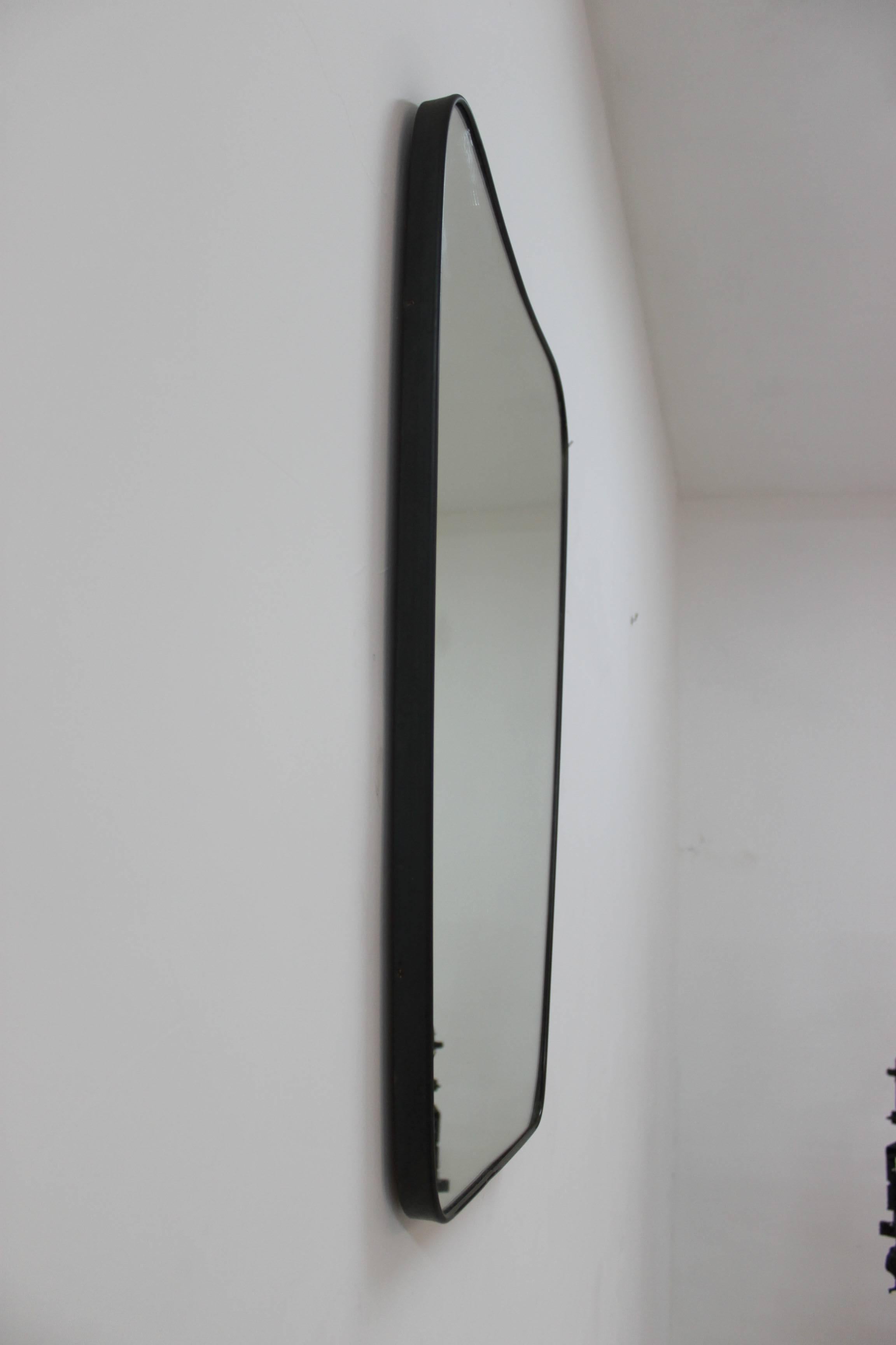 Mirror in the style of Gio Ponti
Brass details
circa 1940.