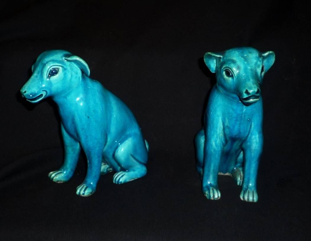 A pair of Chinese Compagnie des Indes export turquoise blue dogs, circa 1830-1850.