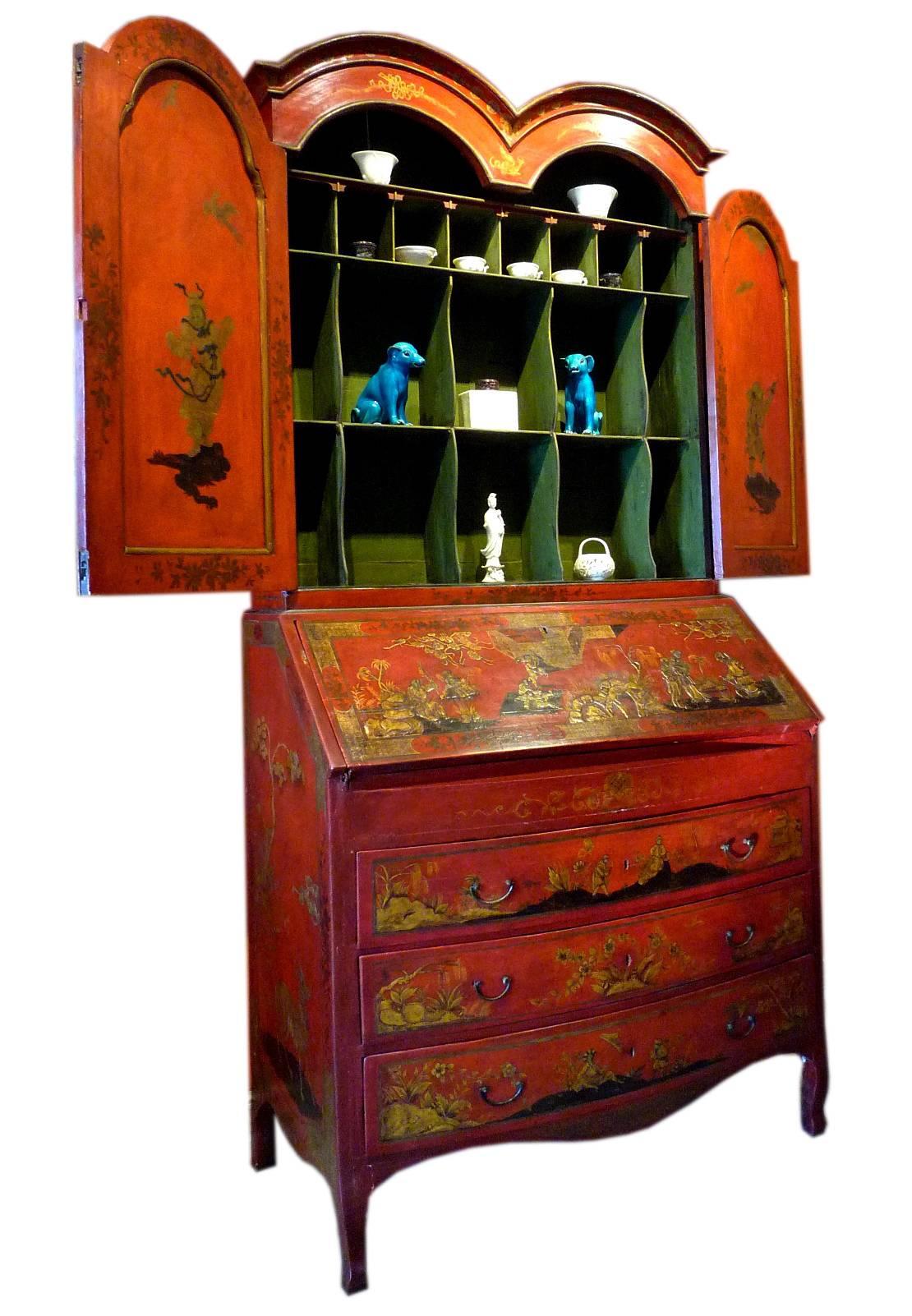 An English George II period chinoiserie red and gold painted bureau bookcase, in the style of Chinese lacquer, circa 1740-1750. 
Very close to creation of Giles Grendey (1693-1780.)