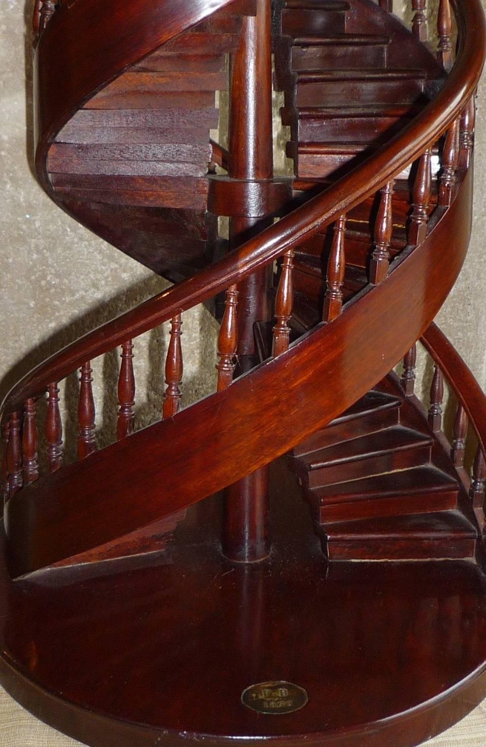 A French mahogany double spiral staircase (model by a master craftsman), dated 1876 and signed F.B.