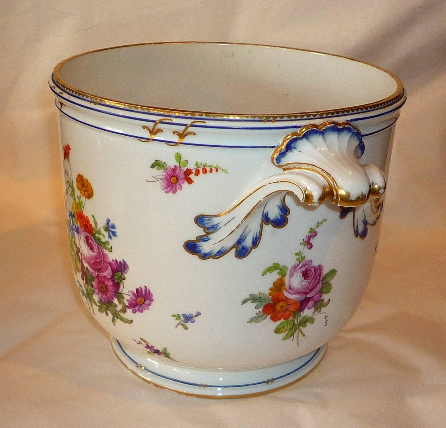 A large bottle (wine or champagne) cooler in Sèvres hardpaste porcelain decorated with flowers, dated 1786 (JJ), painter Bouillat.
