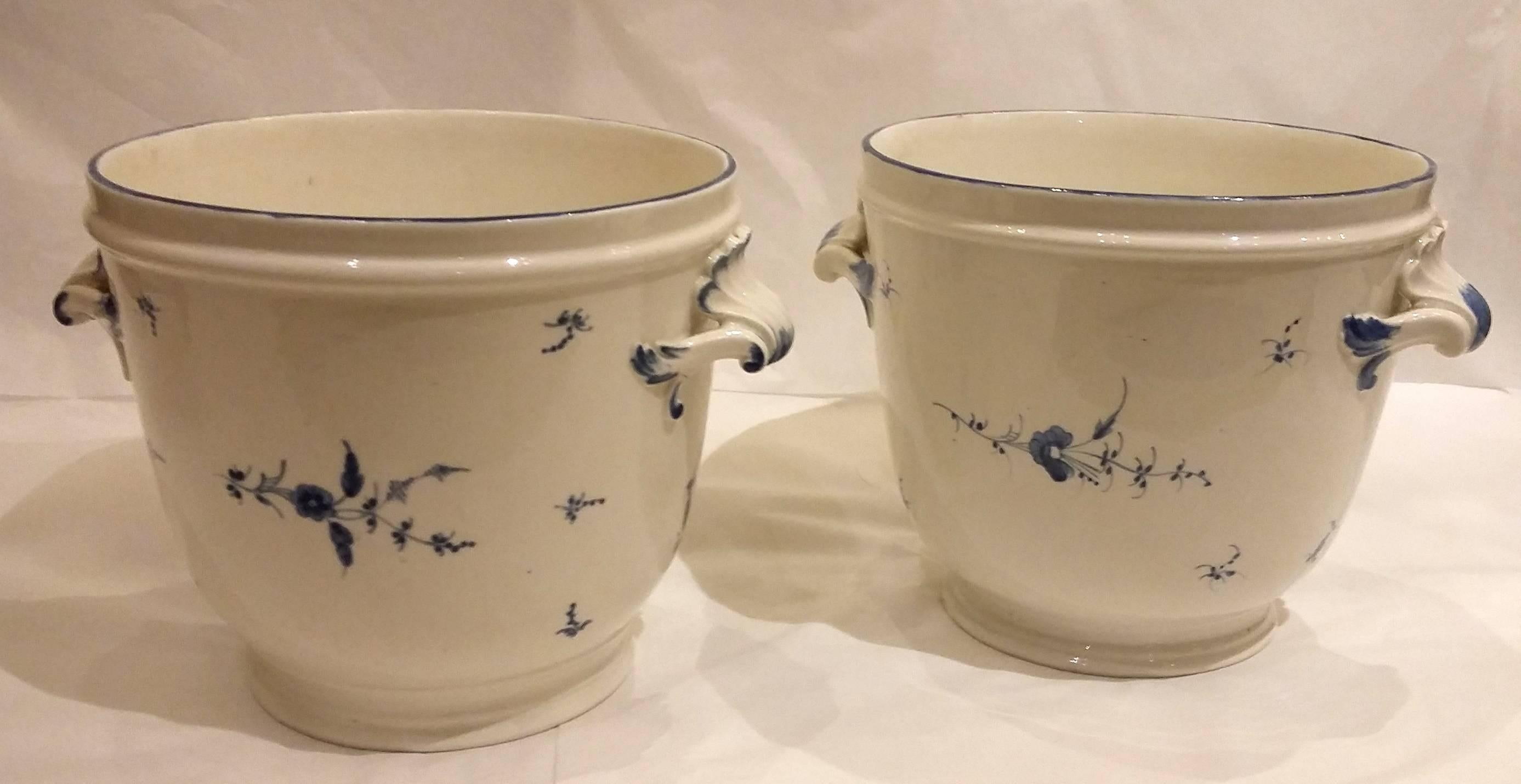 A set of 18th century Chantilly soft paste blue and white decor of ‘Chantilly sprigs’, circa 1760-1770. Total of 53 pieces:
30 plates
16 plates with basket weave border
One pair of wine coolers
One large dish
Three round dishes
One sugar