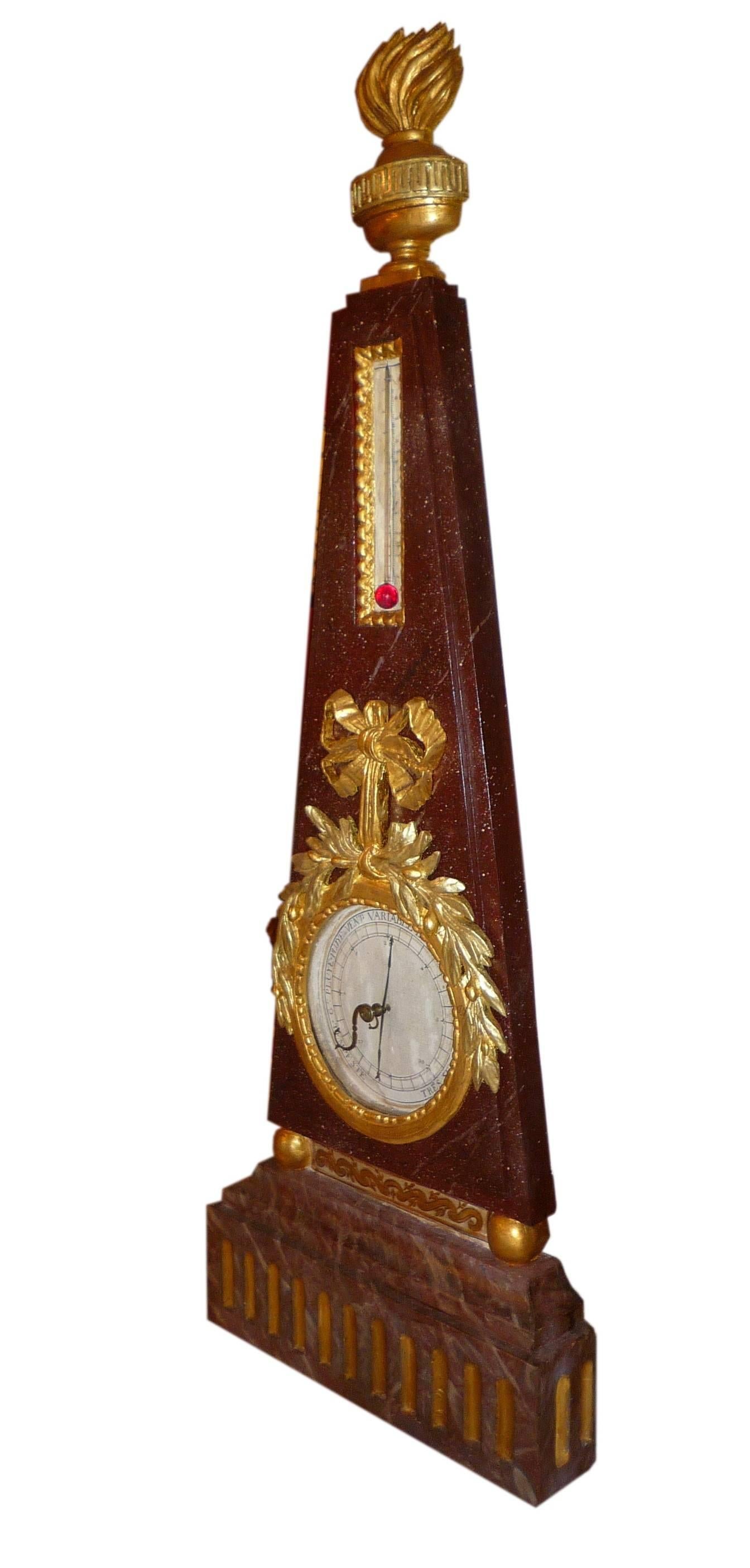 A French Louis XVI period painted wood imitating porphyry and giltwood (two colors) barometer, with thermometer, circa 1780.
Does not work anymore.