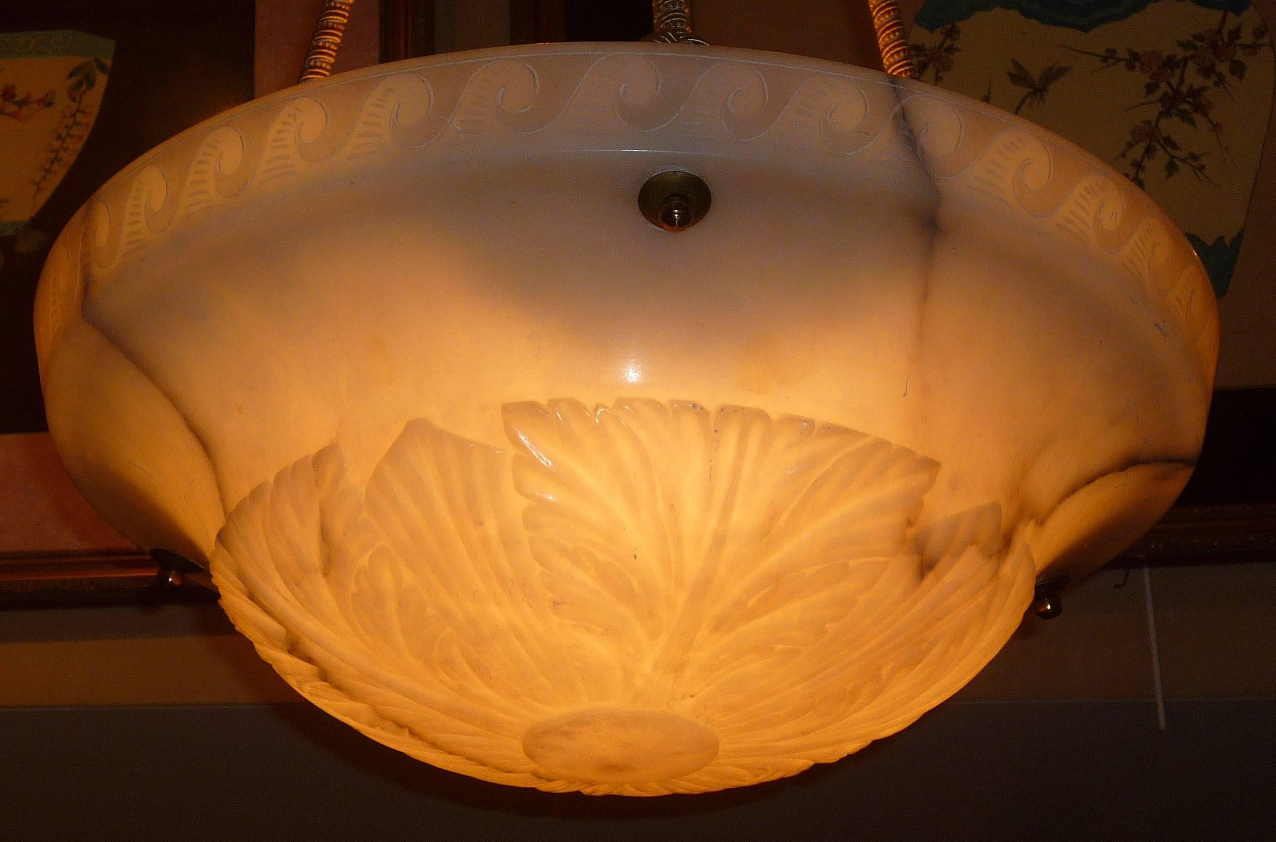 A French Art Deco period alabaster lighting fixture in the shape of a neoclassical coupe, with Greek key decor, circa 1925.