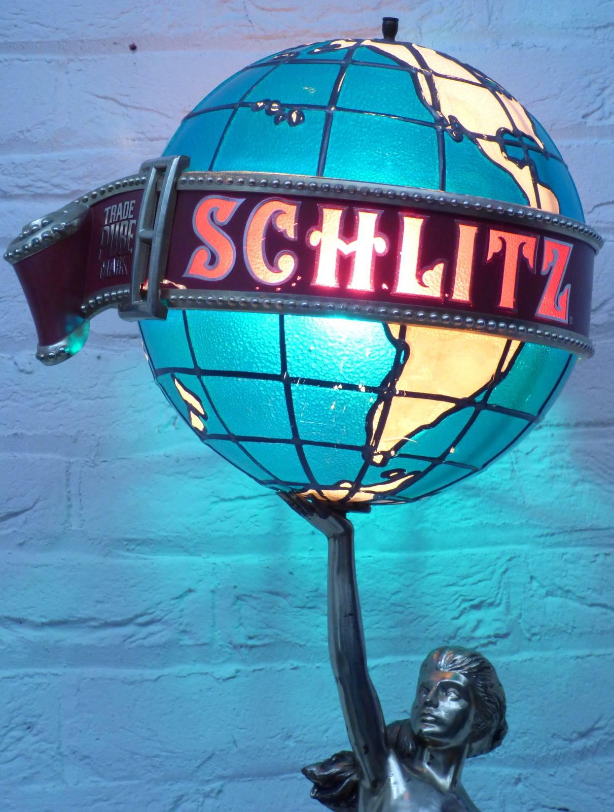 Wonderful merchandising by Schlitz Beer. The statue is in wonderful condition.