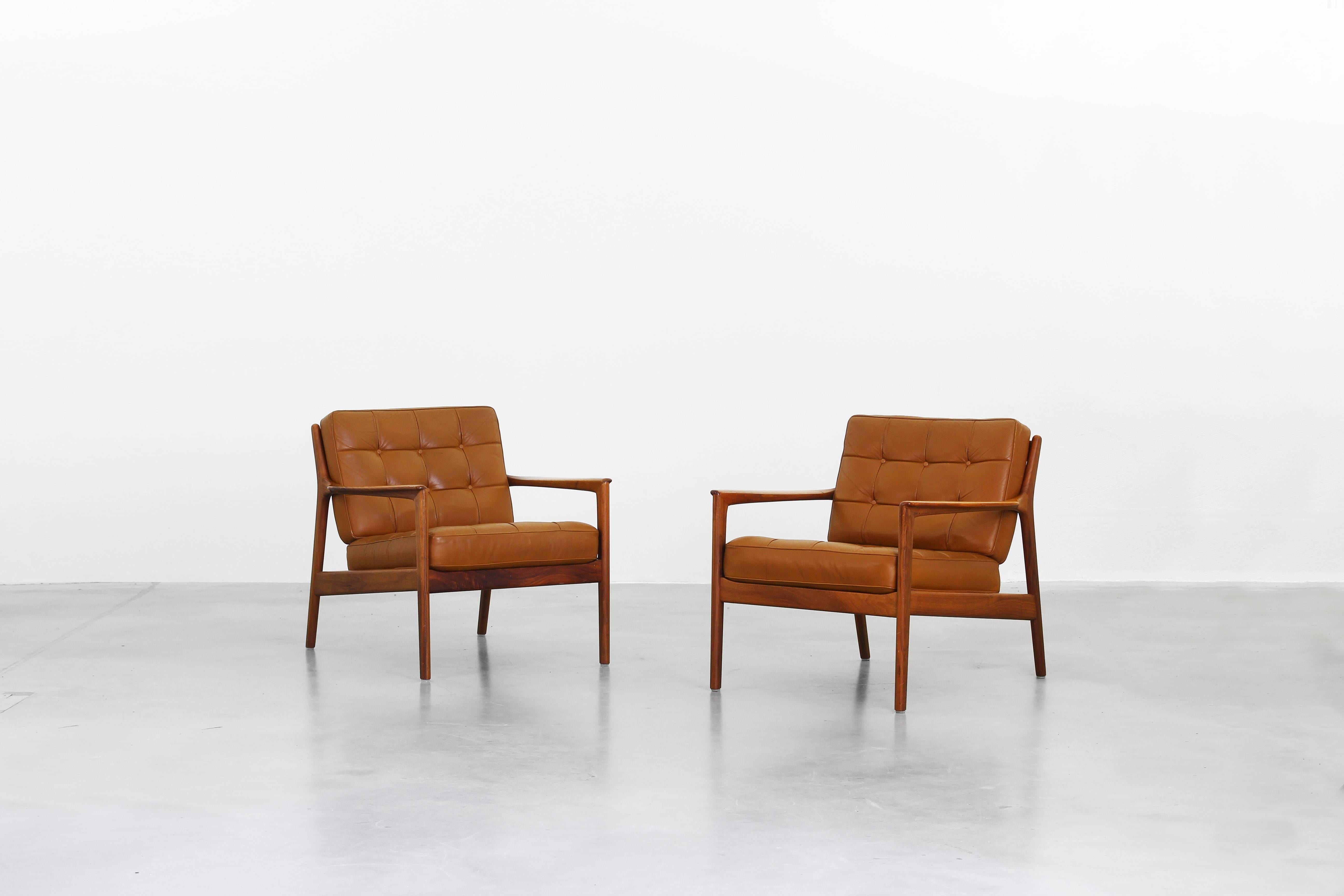 A beautiful pair of lounge chairs by Folke Ohlsson for DUX, designed in the 1960s and made in Sweden.
Both lounge chairs are in a very good condition with little signs of use without any cracks, breaks or damages.
We offer worldwide shipping.