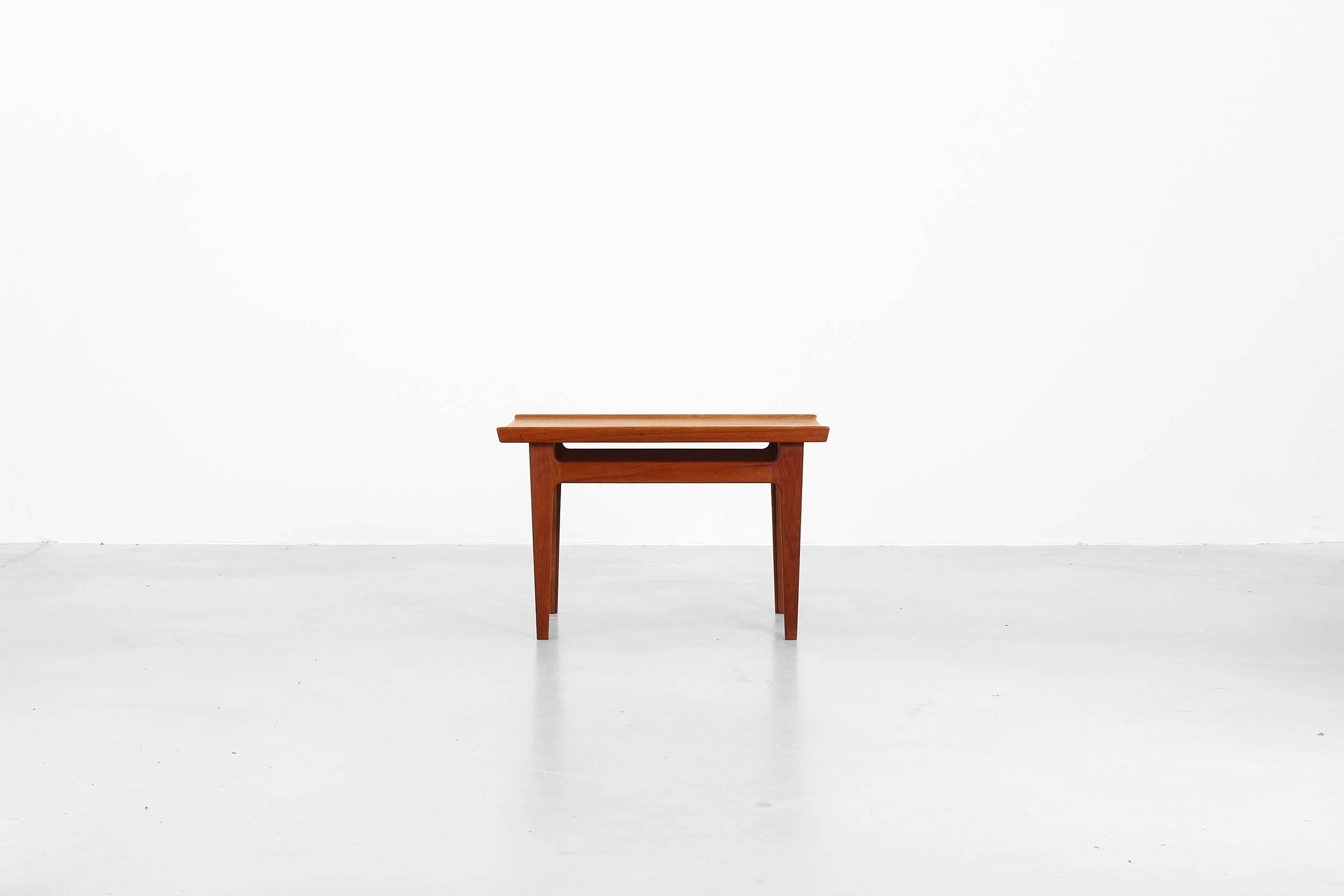 Beautiful coffee table by designed by Finn Juhl for France & Daverkosen, in the 1950s made in Denmark. This coffee table is made of teakwood and is in a very good condition with just little signs of use.