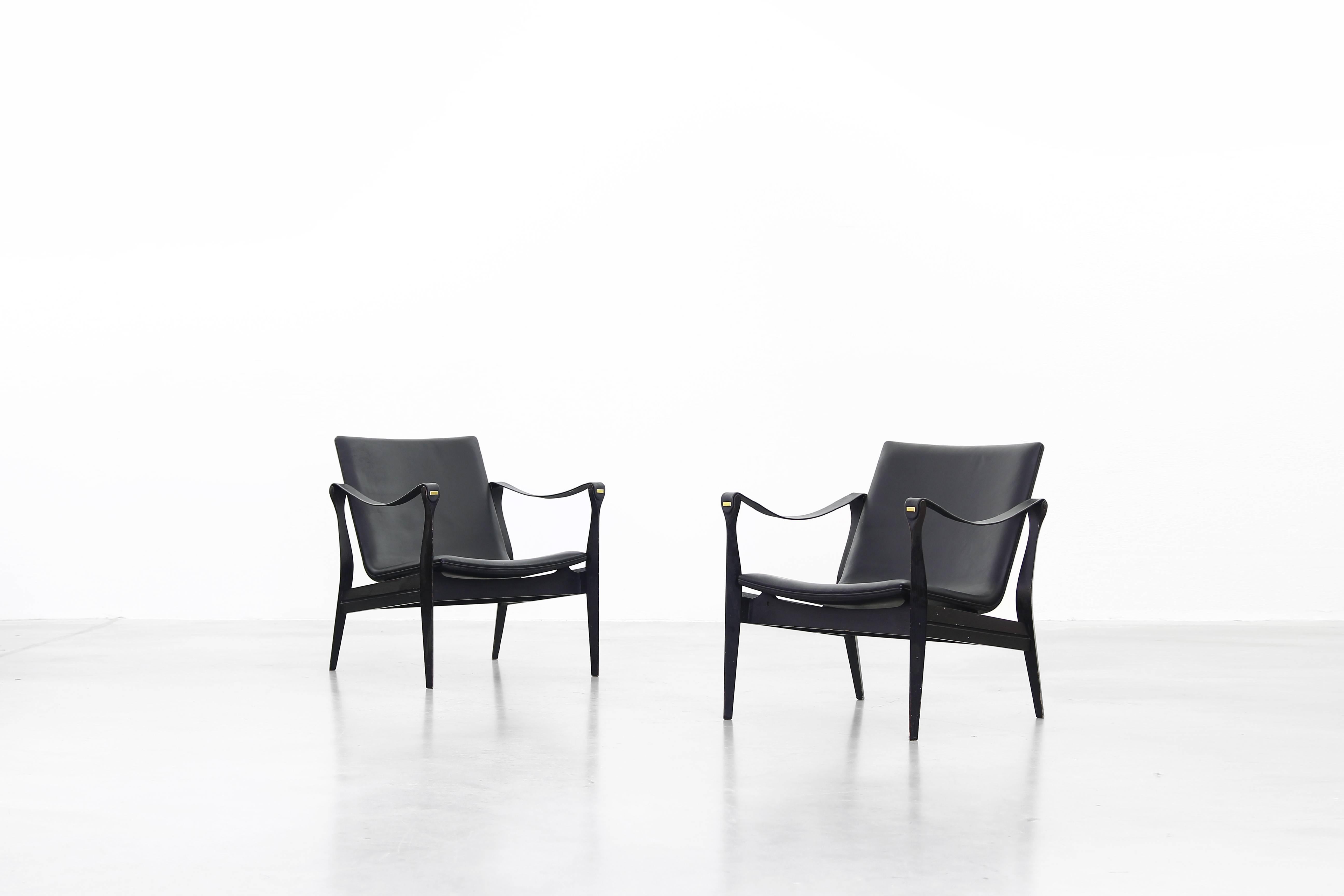 Very beautiful pair of lounge chairs by Karen & Ebbe Clemmensen for Fritz Hansen in the 1960s. 
The chairs were beautifully restored and are in a wonderful condition.
  