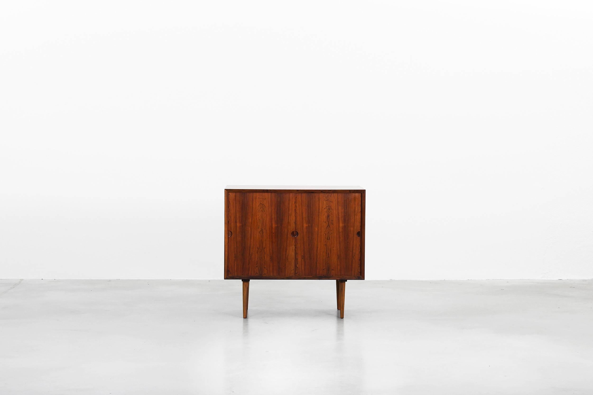 Beautiful commode designed by Poul Cadovius in the 1960s, made in Denmark. The commode is made of rosewood and still in a very good condition with little signs of use. We have a second commode with the same dimension in our stock.
       