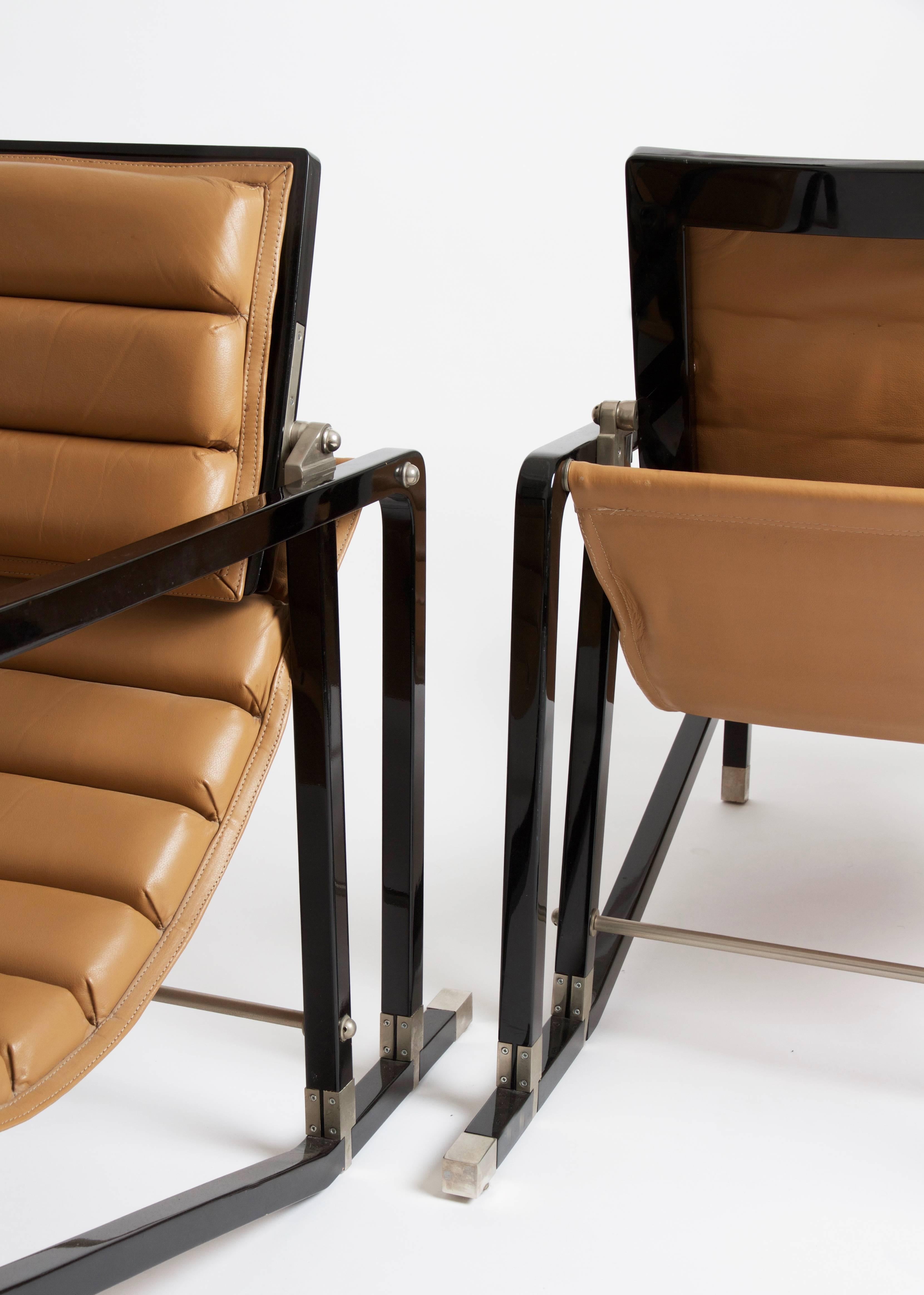 Eileen gray (1879-1976).
Pair of "Transat" chairs.
1st Edition by Andrée Putman for Ecart International, France, 1978.
Black lacquered wood, brushed metal, leather.
Excellent condition.
Model designed by Eileen Gray in 1927 for the