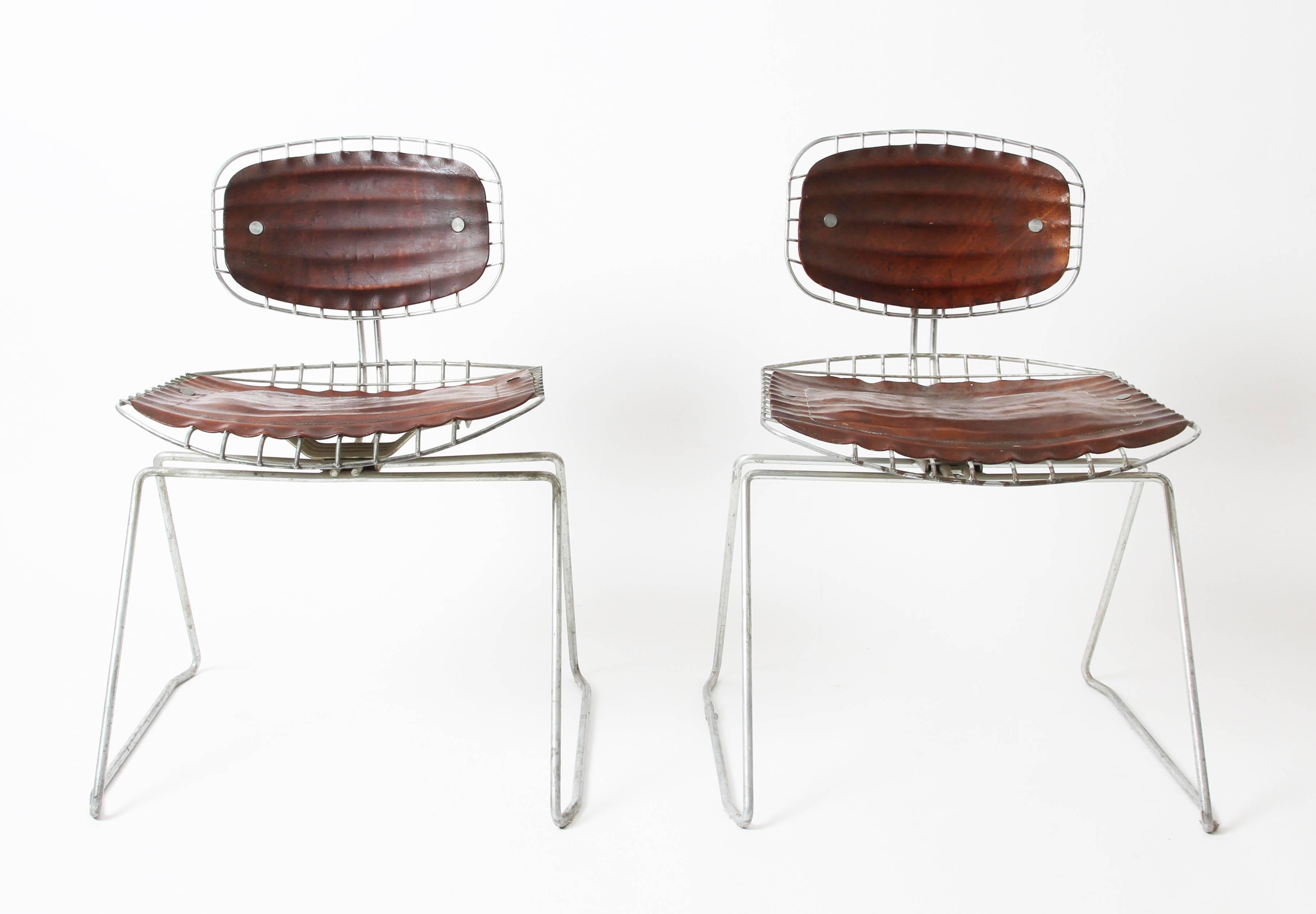 Michel Cadestin
leather and metal Beaubourg chairs,
Design in 1976 for Centre Georges Pompidou, Paris.
Beautiful condition with nice patina on originals leathers pieces.