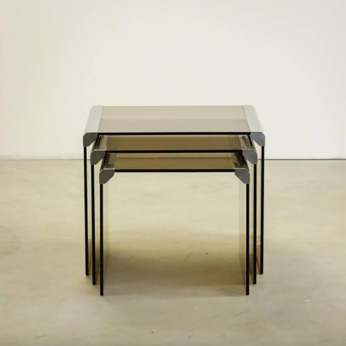 Pierangelo Galloti
Three Gigognes side tables, Gallotti & Radice manufacturer, circa 1980
Smoked glass, chrome
Excellent original condition
The smallest table measures H 34 cm x D 41 cm x W 38 cm.
The middle table measures H 37 cm x D 41 cm x W