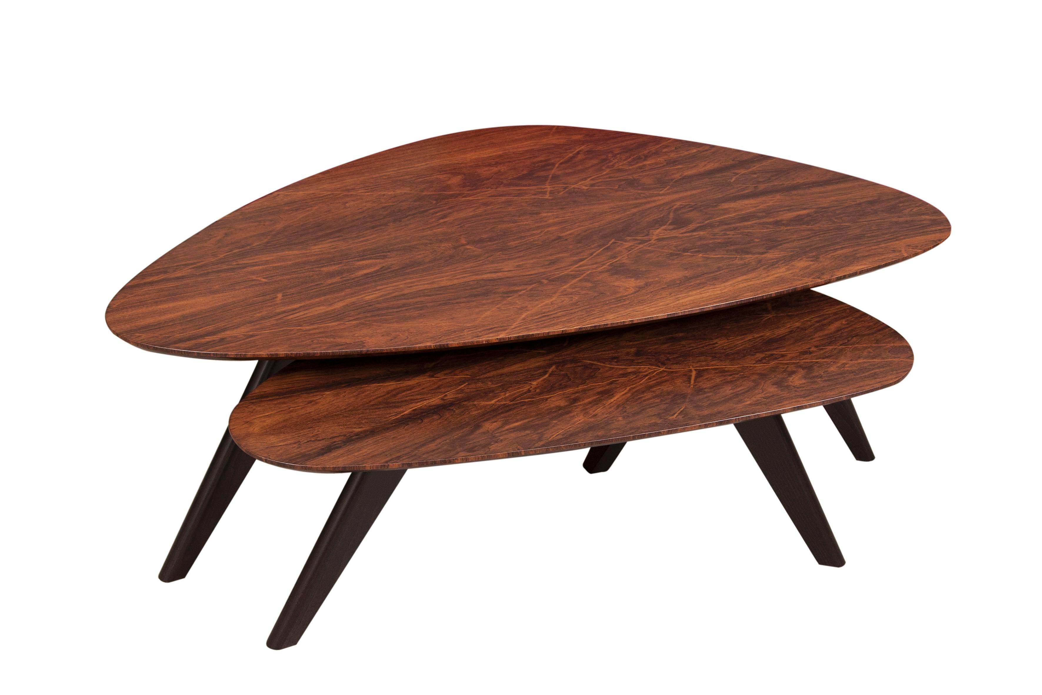 Practical curved design centre tables. Imbuia wood veneer surface and tripod base in solid beech.

Sizes available:
W 150 x D 90 x H 40.
W 120 x D 70 x H 40.
W 90 x D 50 x H 33/40.
Other sizes available on order.
 