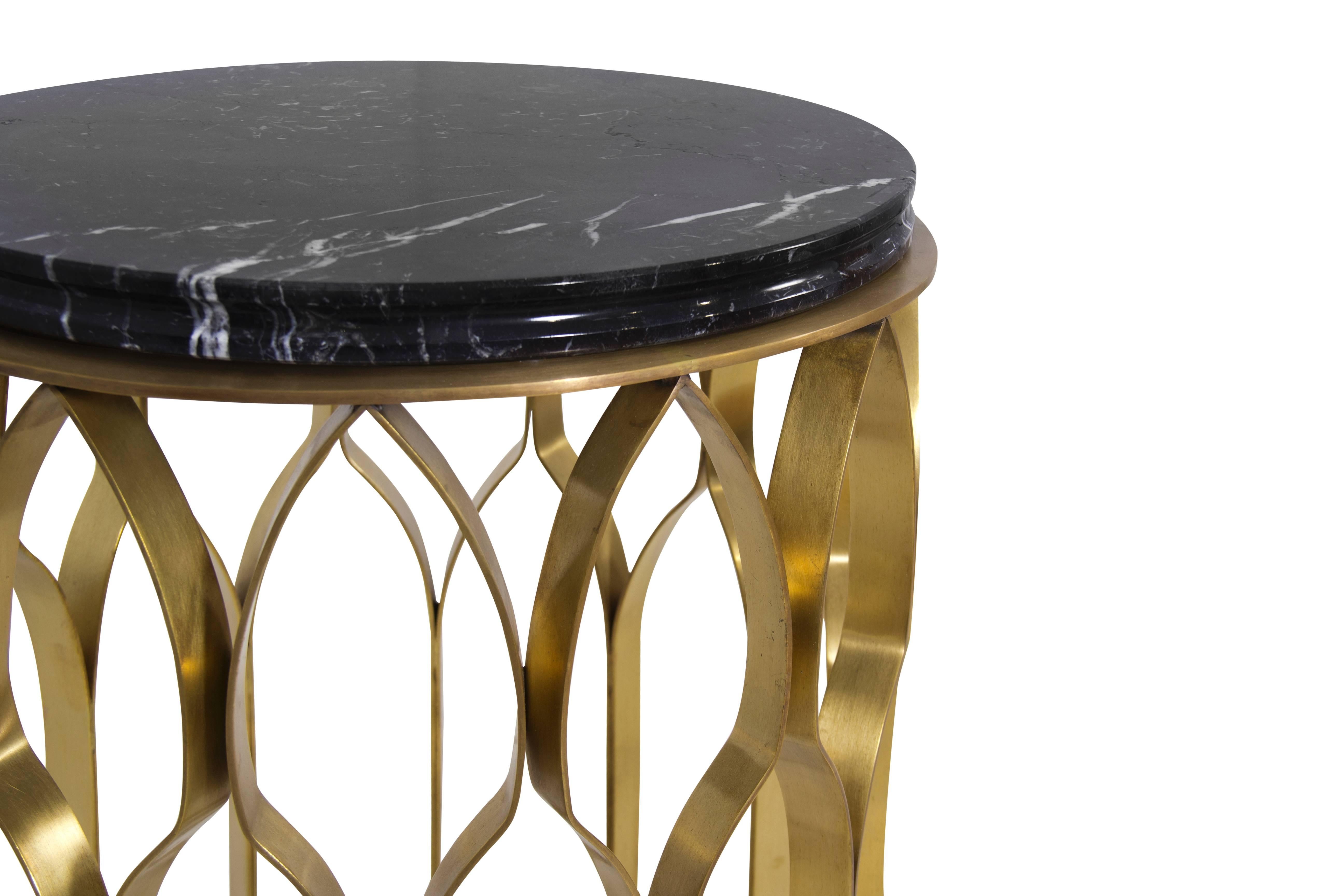 The world's finest mosques are the influences for this aptly named coffee table. The marble and brass design is the perfect hybrid of strength and delicacy, much like its inspiration. Its architectural element is most obviously depicted in its