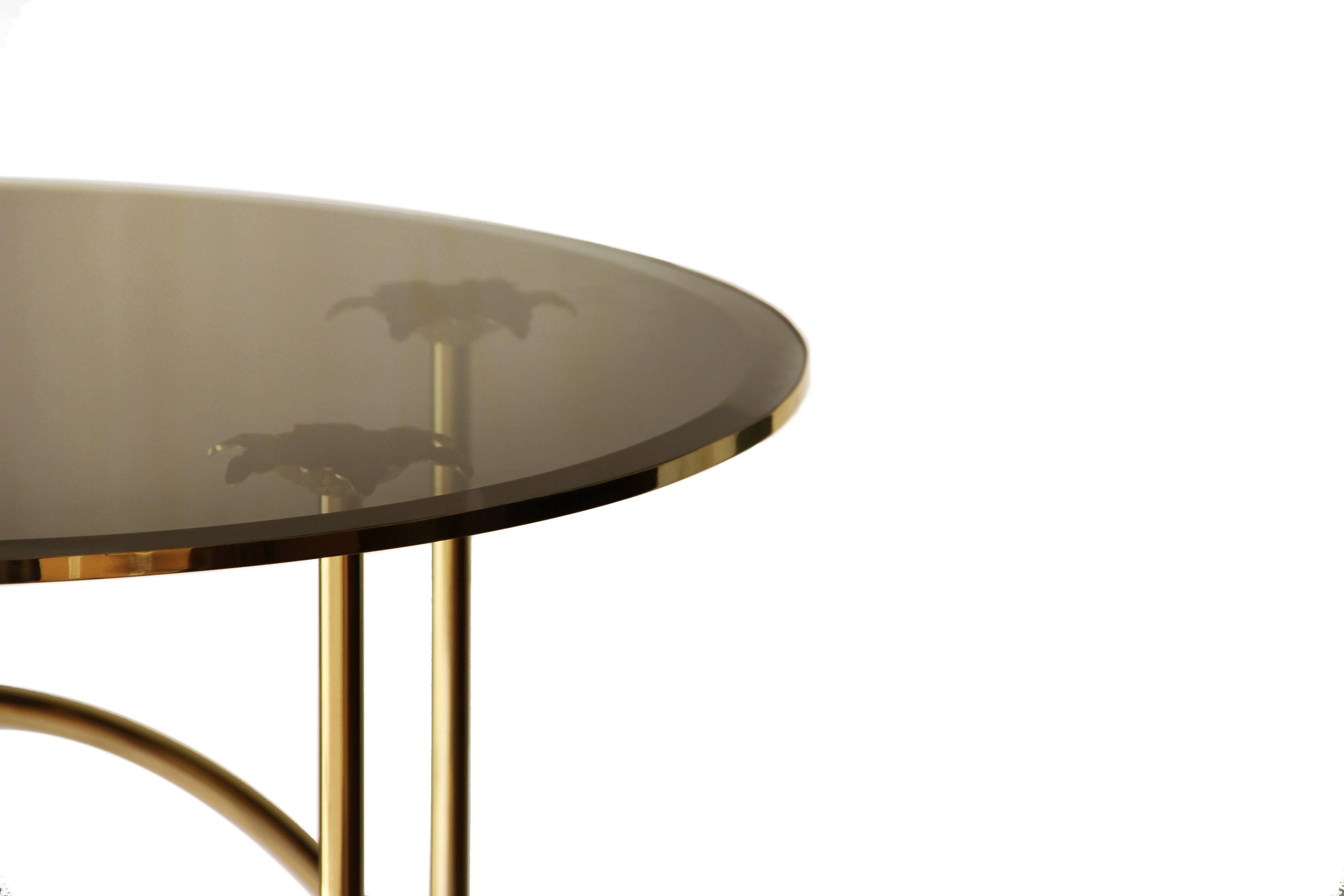 The Kiki side table evokes the romantic and seductive beauty of Parisian cabaret life. The revealing frilled undergarments, the surprise high kicks, hoops in a circle accompanied by blinding splendor give this table a sassy new spin on design.