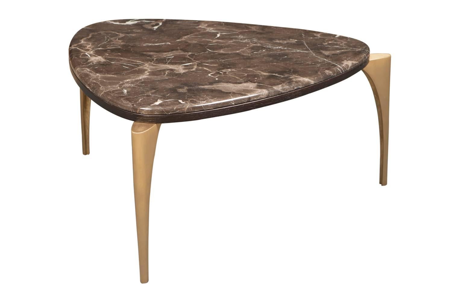 Very unique polished Emperador marble-topped cocktail table with unique cast brass or cast iron feet. 

Standard size: 
W 90cm
D 90cm
H 42cm
