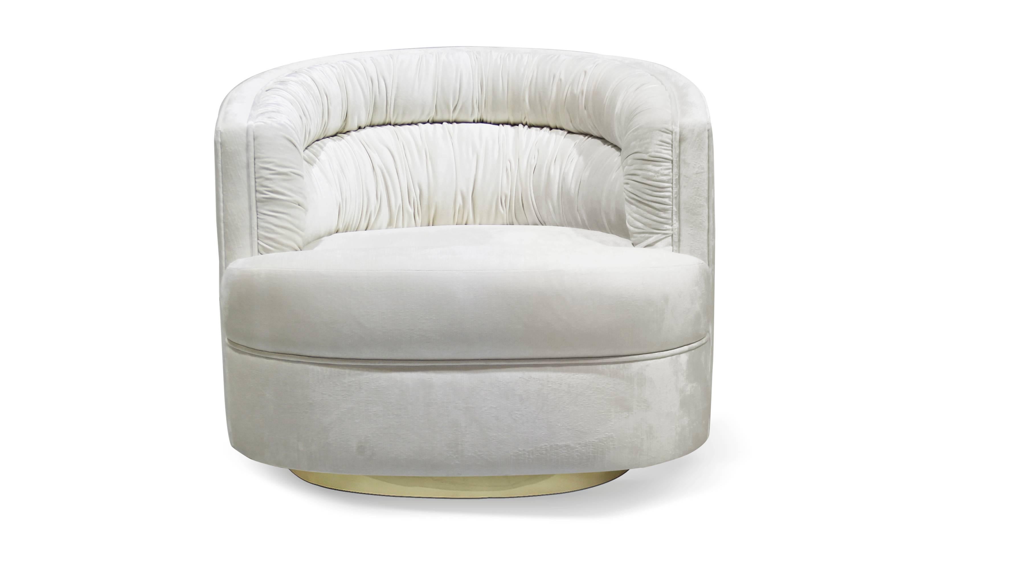 Like the olive to a martini, sipping cocktails and lounging in luxury go hand-in-hand. The plush body of the cocktail armchair hugs your every curve while you softly melt into the creamy velvet upholstery fabric. Cheers!

Upholstery: Koket Fabric