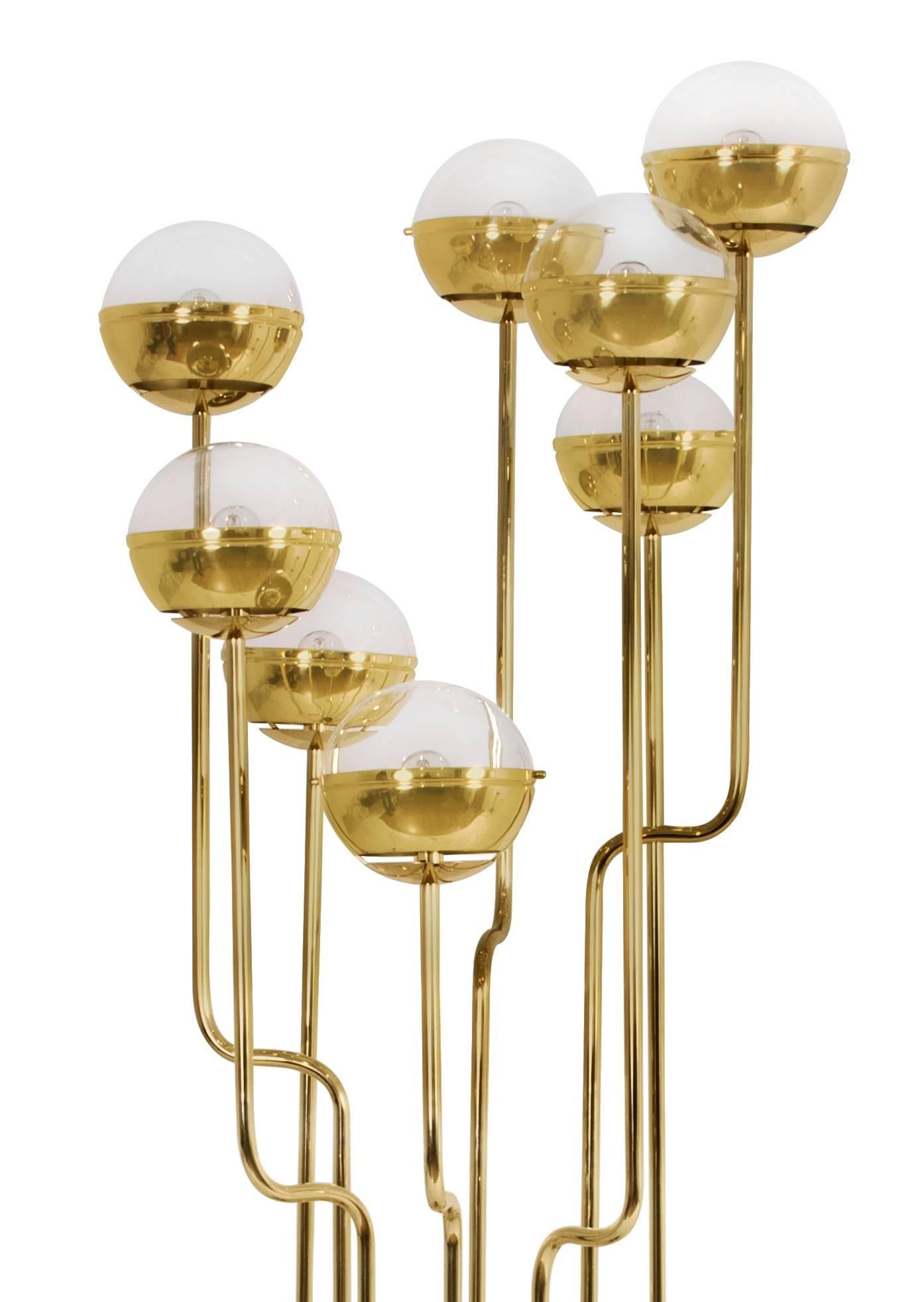 Gold plated brass structure and gold plated brass shaders, with eight glass light globes and black marble base.

TECHNICAL SPECIFICATIONS:
BULB HOLDERS 8 x E14 (EU/UK), E12(USA) bulb
VOLTAGE 220 V - 240 V
WATTAGE 40 watts
WEIGHT 55 kg  121.3