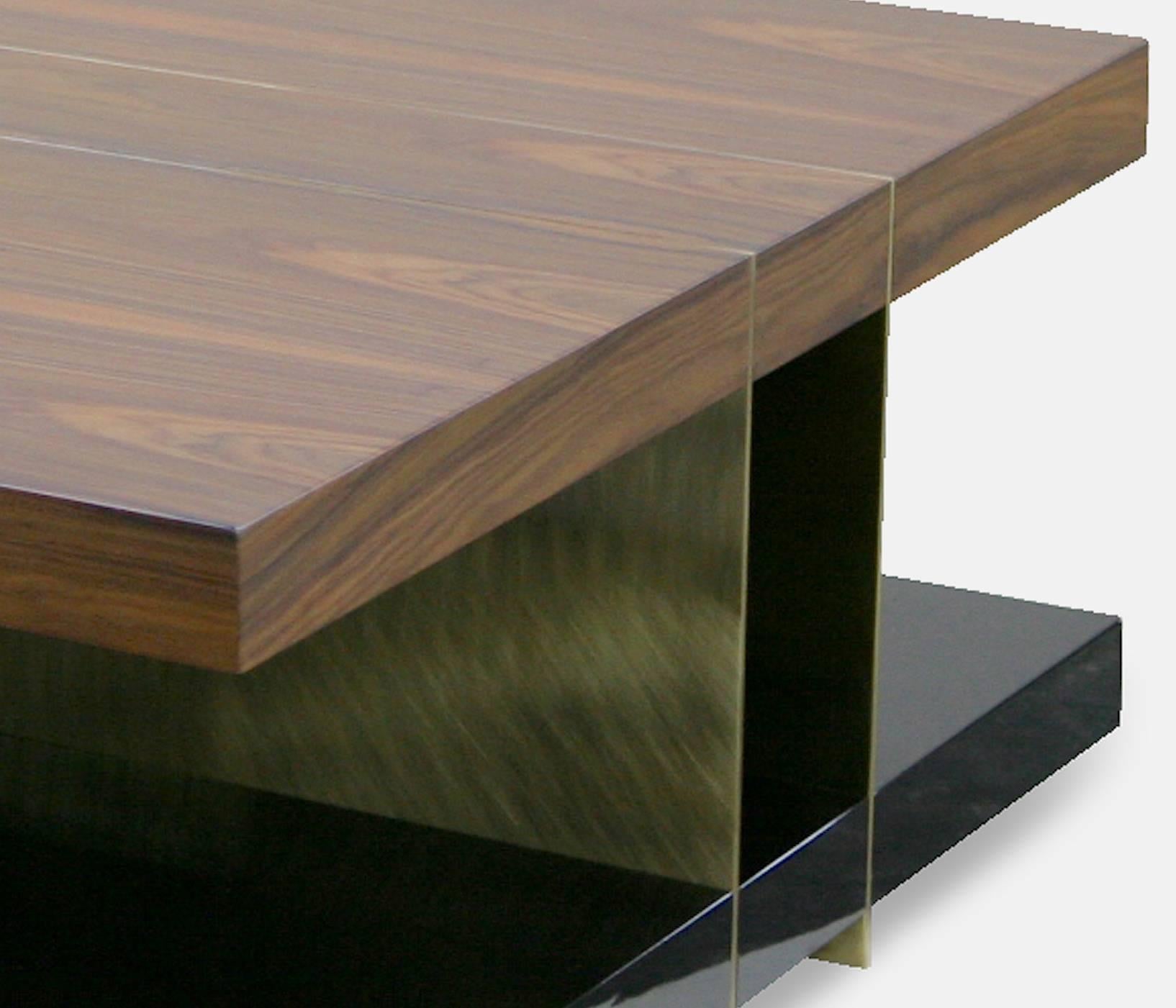 Modern asymmetrical coffee table with elegant variety of brass and timber finishes. It is inspired by the Lowlands of Scotland, called the Lallans, which designates the integration of some Scots dialects. Lallan center table combines four different